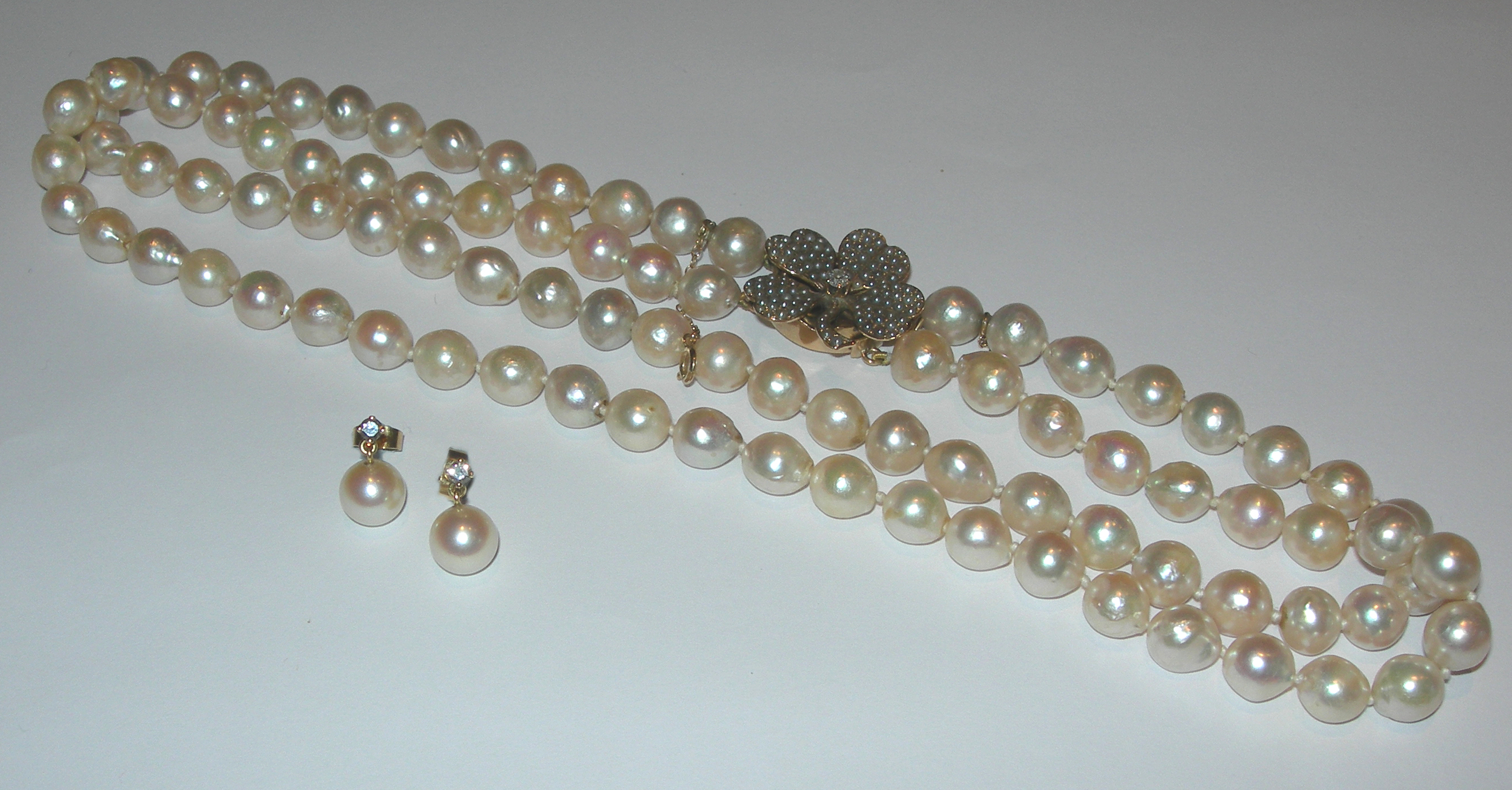 An Edwardian cultured pearl two-row necklace,