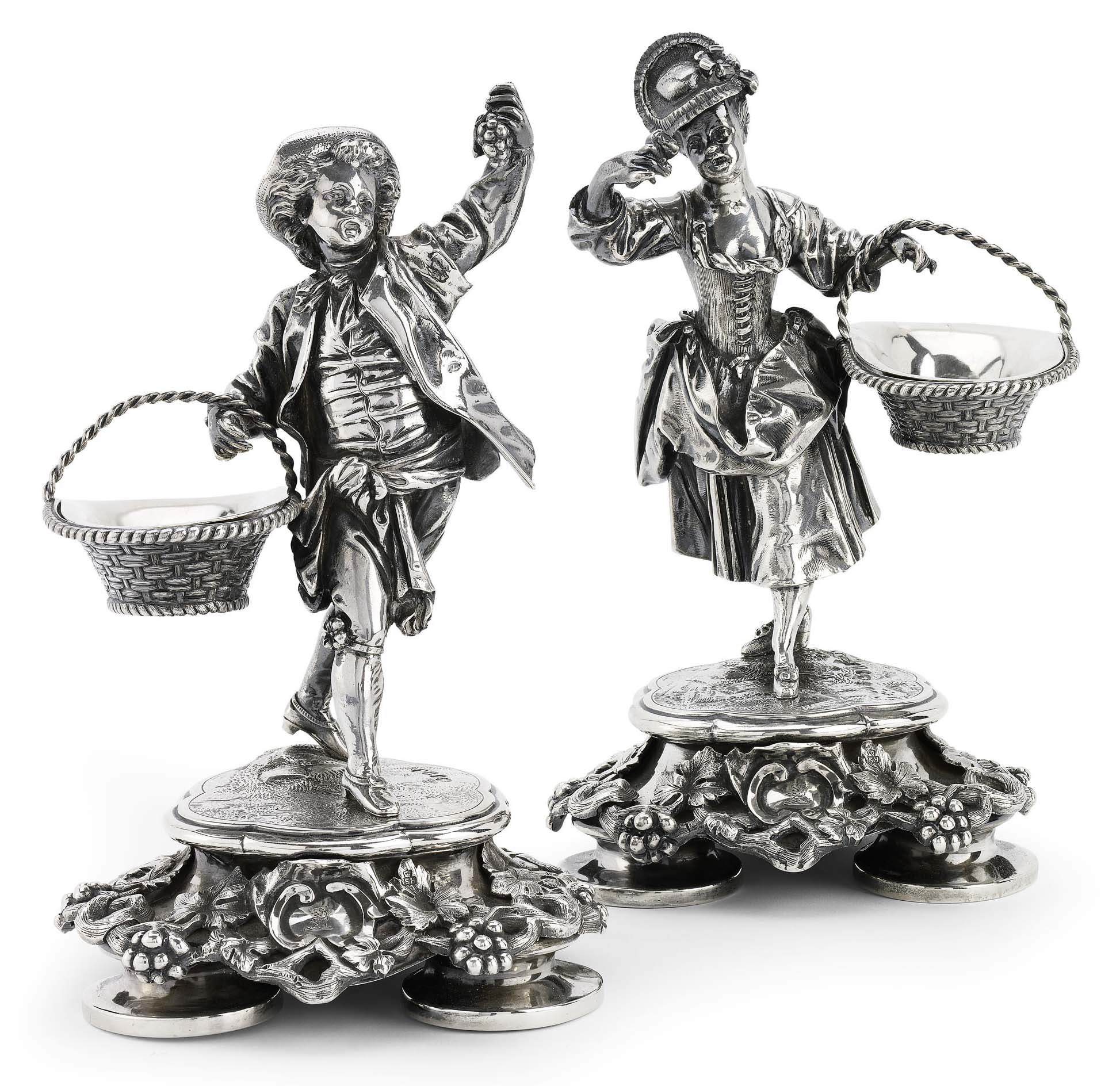 A pair of Victorian silver figural salts