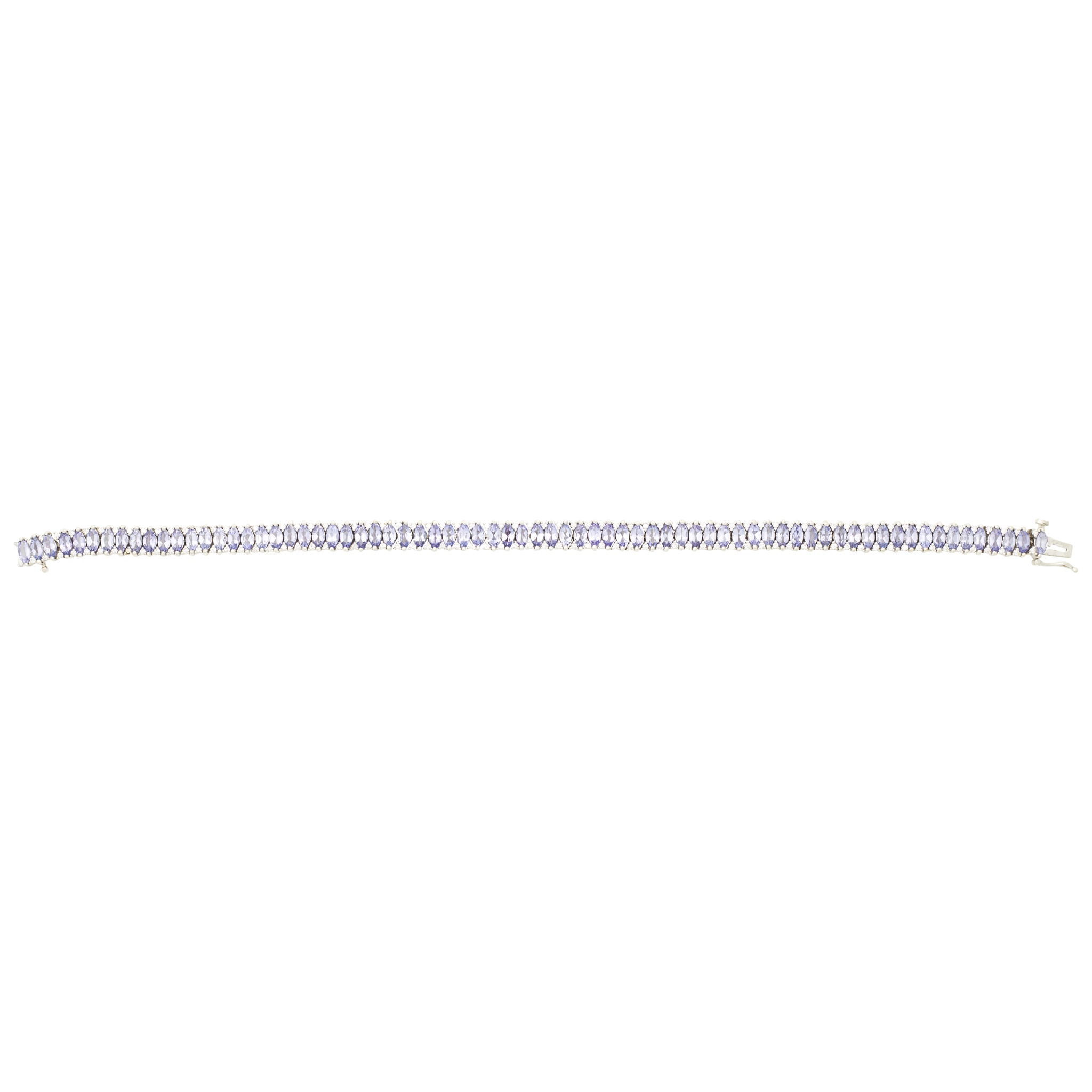 A 18ct white gold Tanzanite and diamond set bracelet