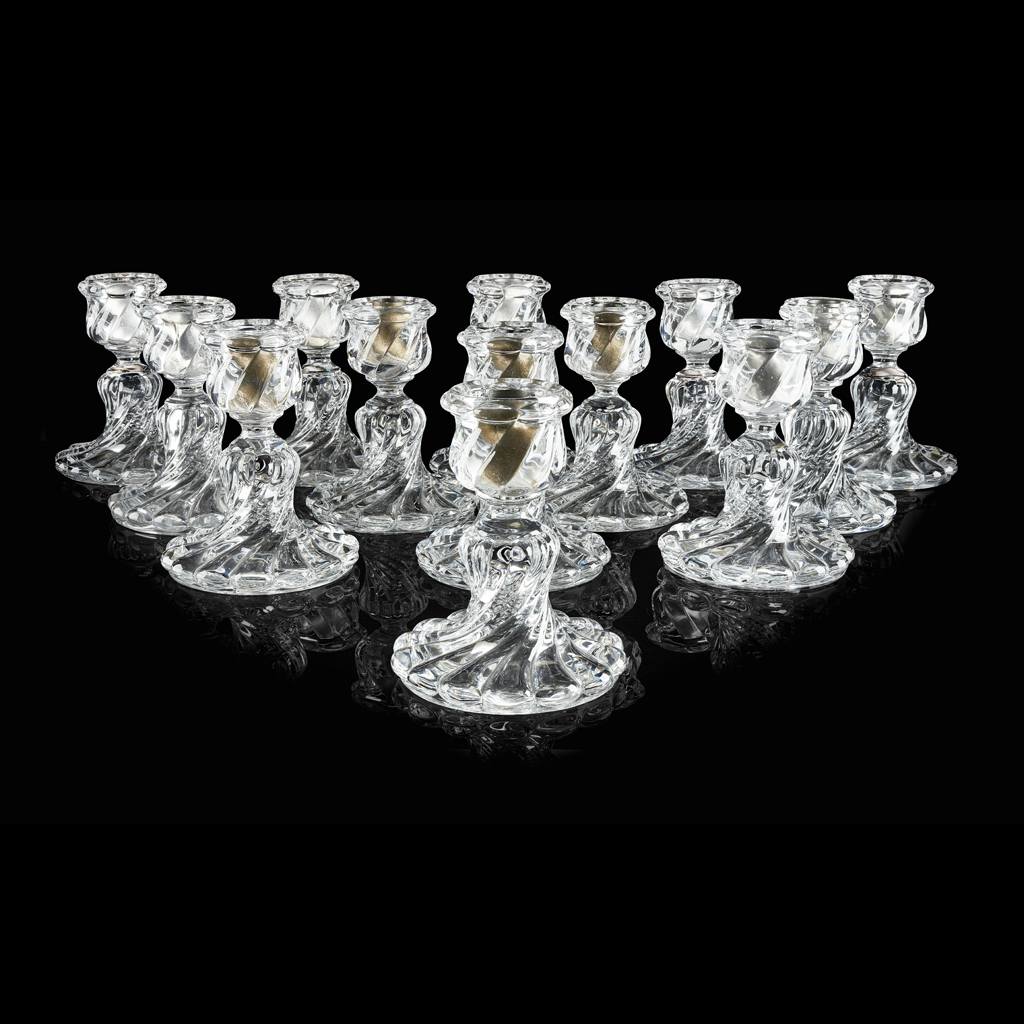 THIRTEEN BACCARAT GLASS CANDLESTICKS