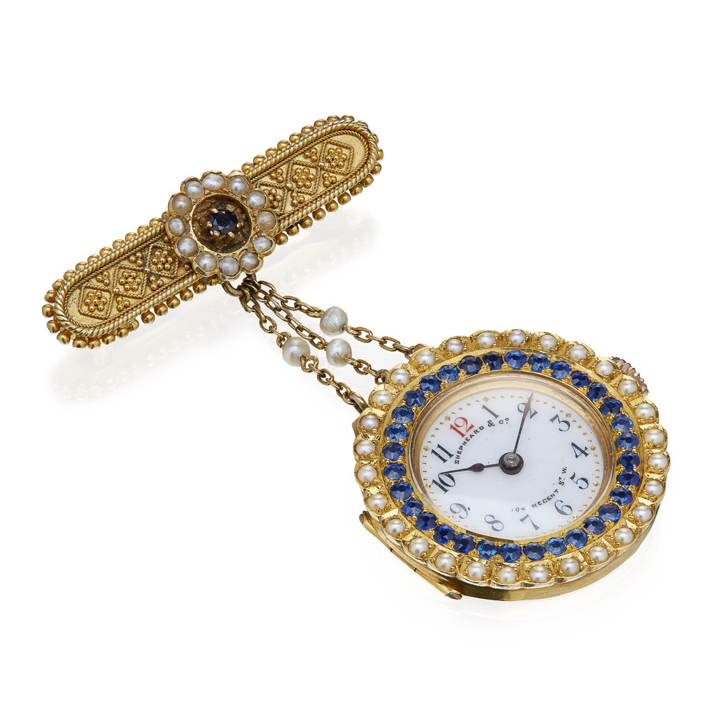 A lady's 18ct gold and gem set fob watch