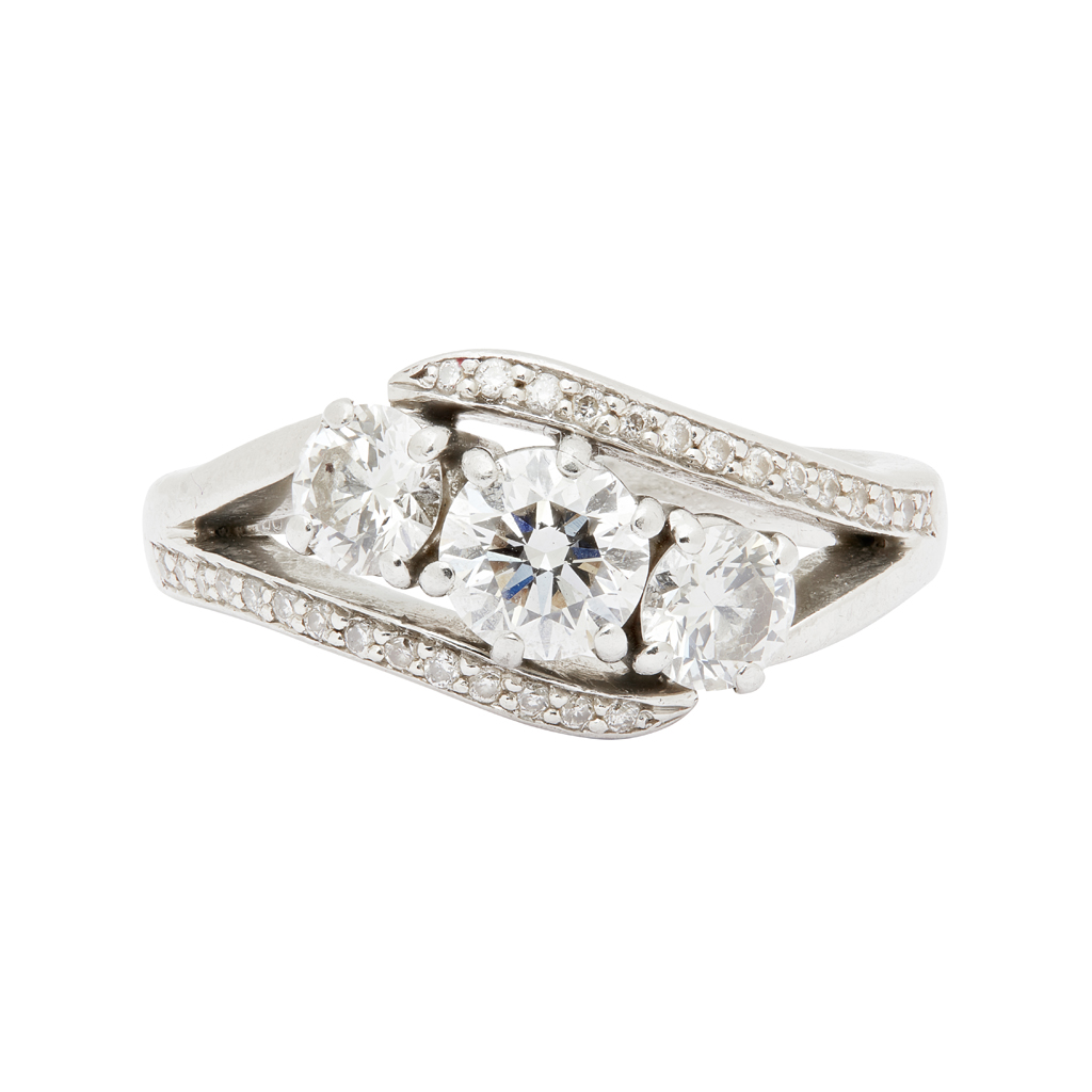 A three stone diamond set ring