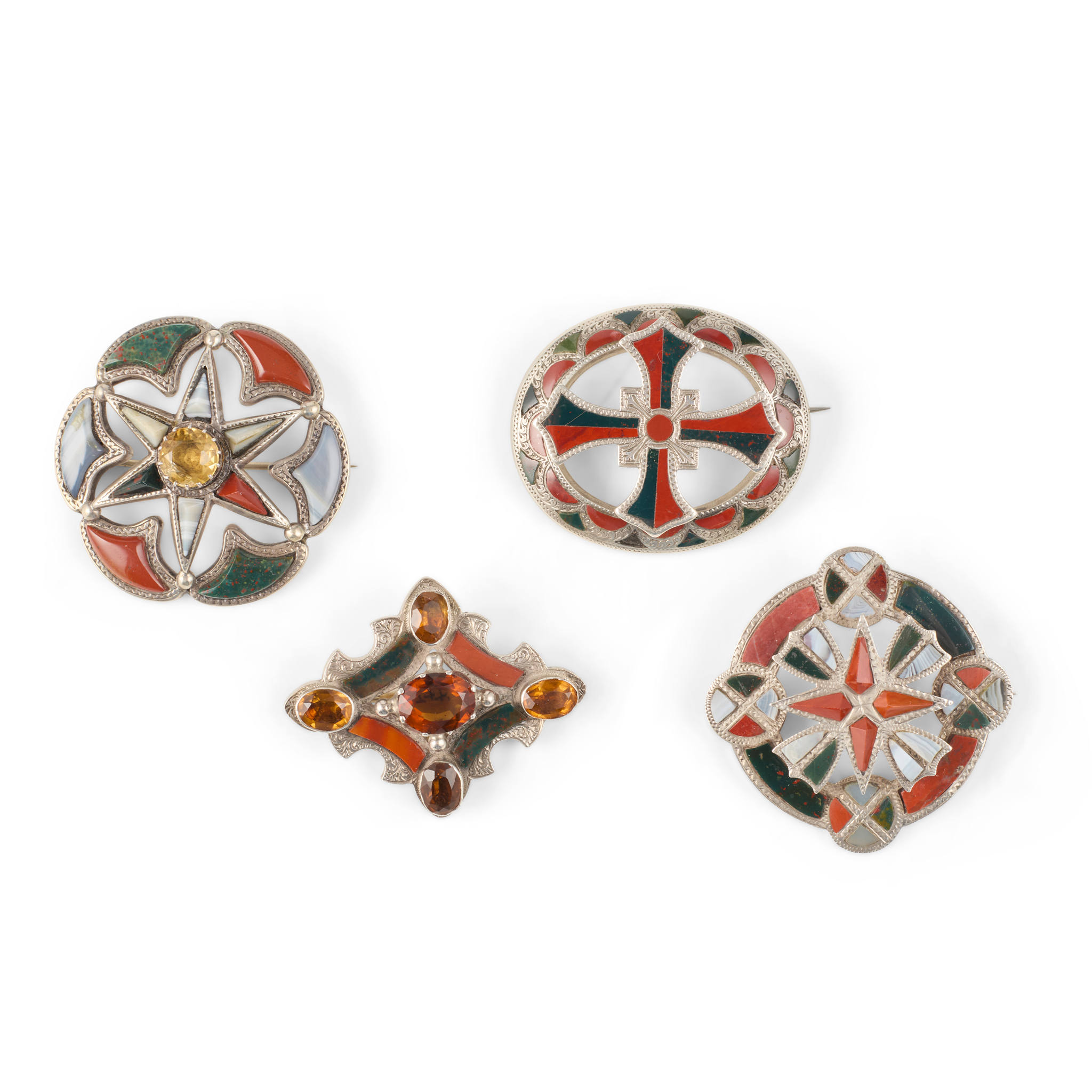 A collection of four Scottish hardstone brooches