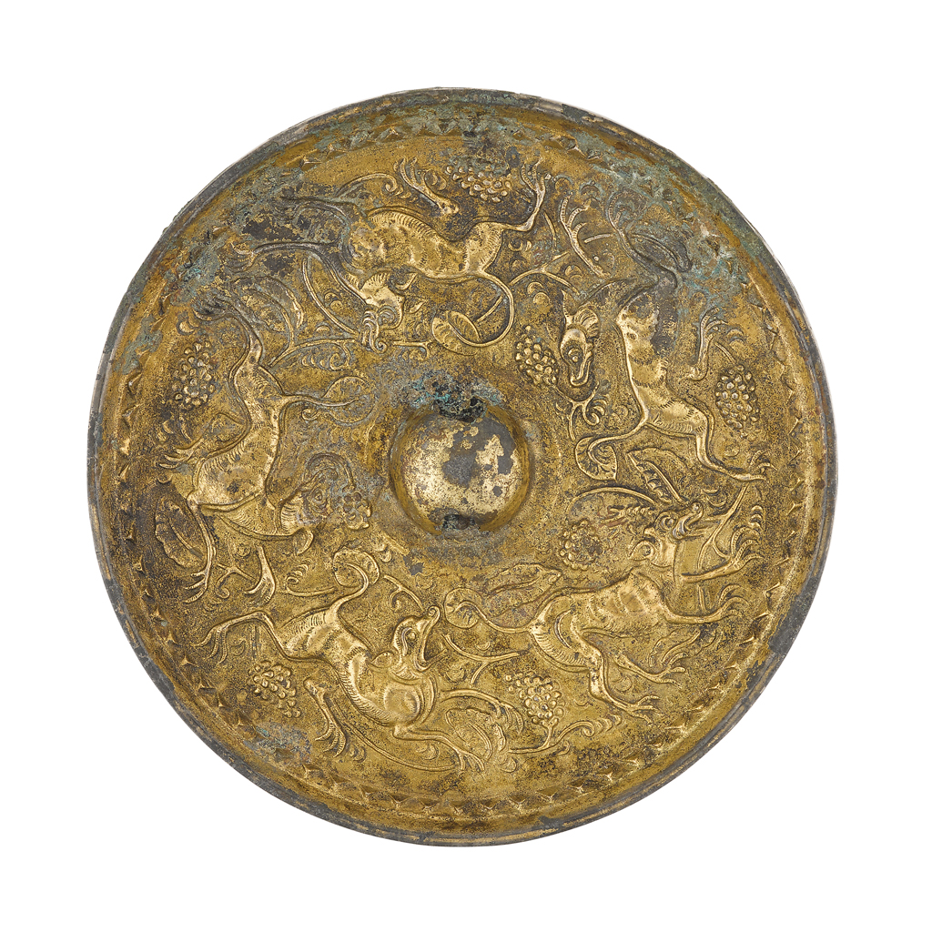 PARCEL-GILT BRONZE 'LION AND GRAPEVINE' MIRROR
