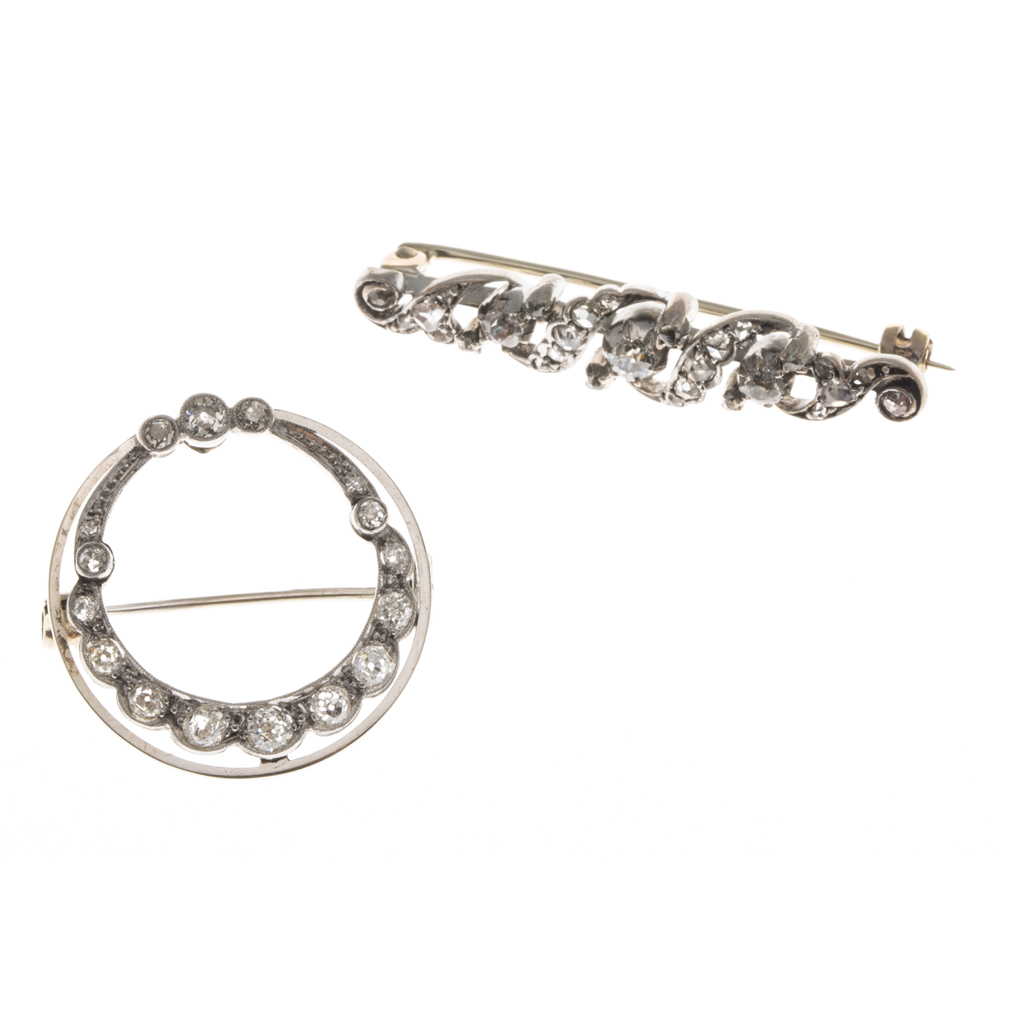 Two diamond set brooches