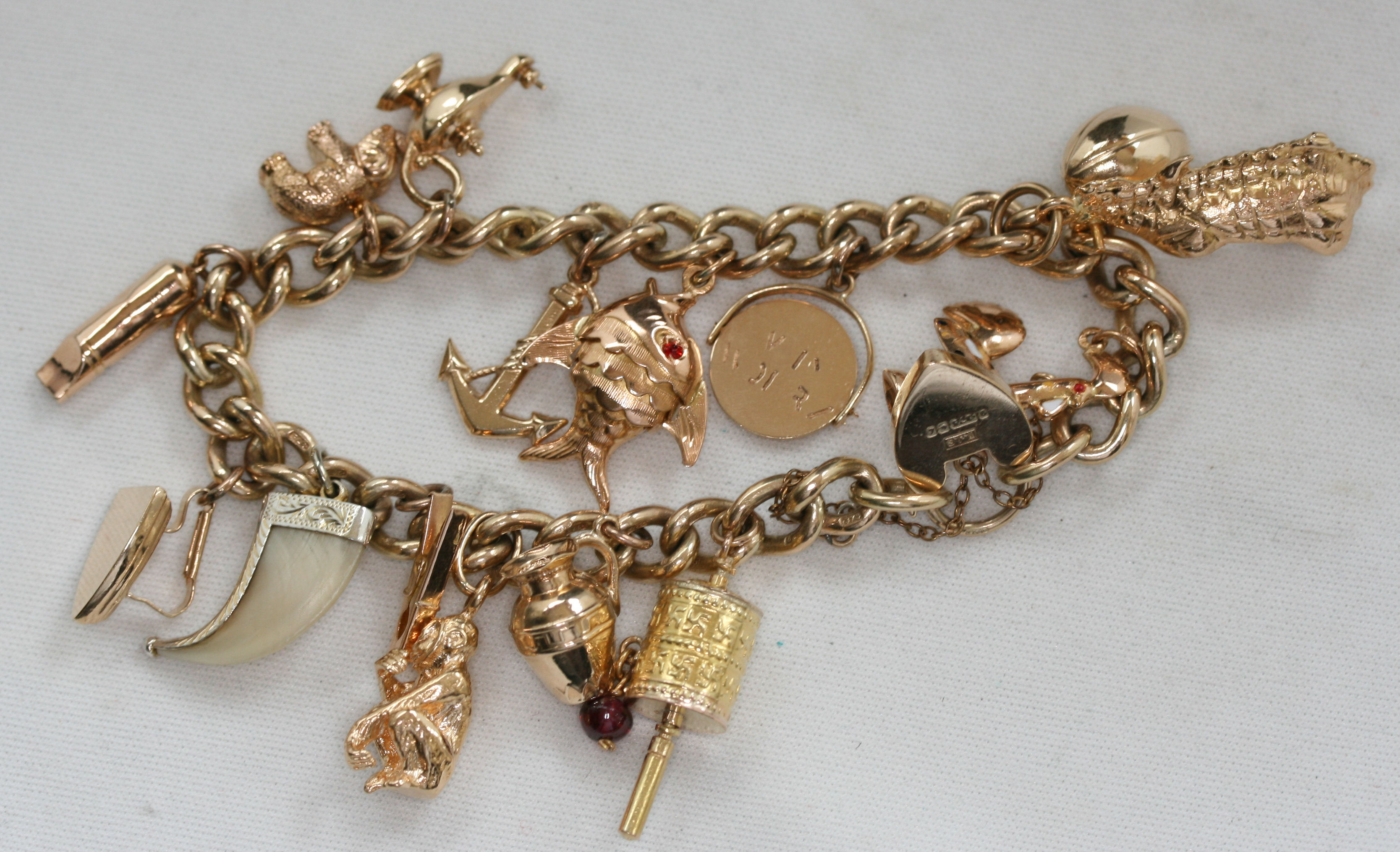A 9ct gold charm bracelet