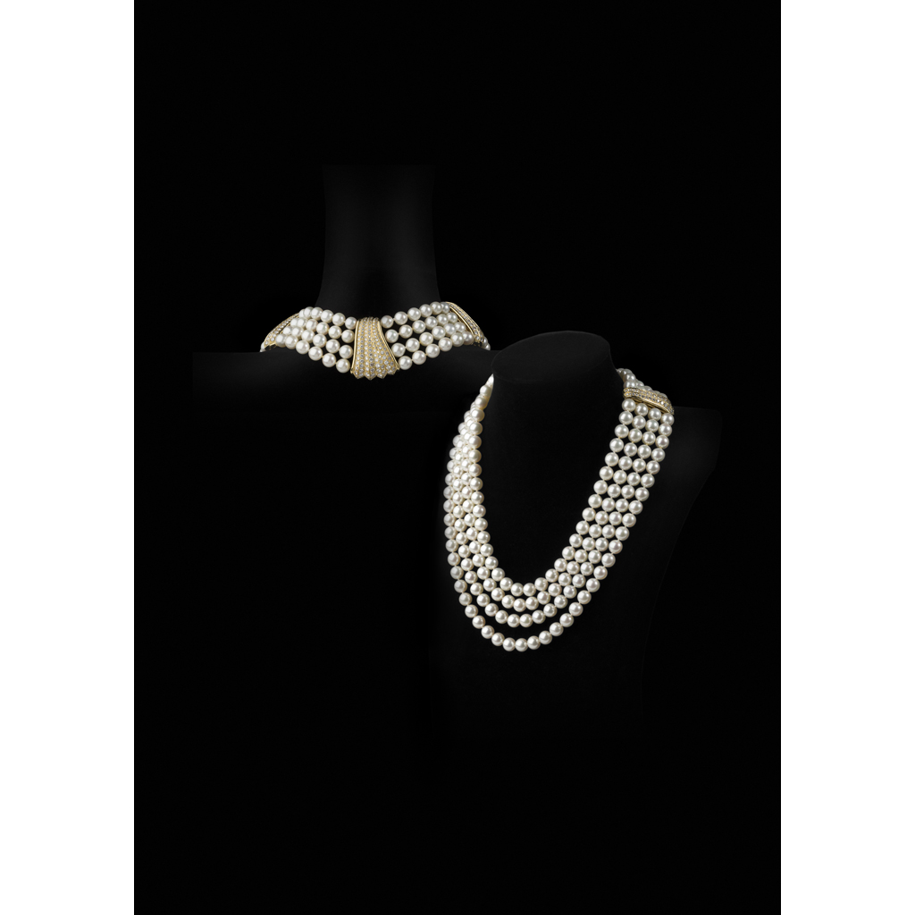 A cultured pearl and diamond set necklace
