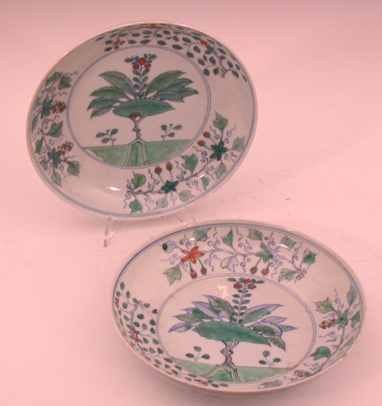 A pair of Chinese 19th century famille verte circular bowls,