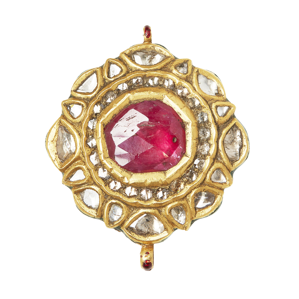 An Indian ruby and diamond set and enamelled pendant