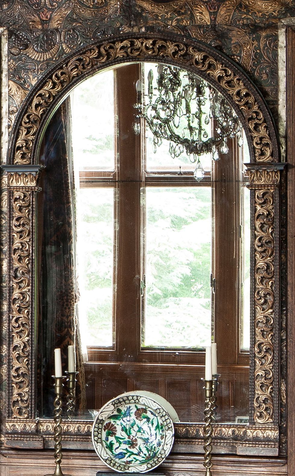 ITALIAN POLYCHROME AND GILTWOOD WALL MIRROR