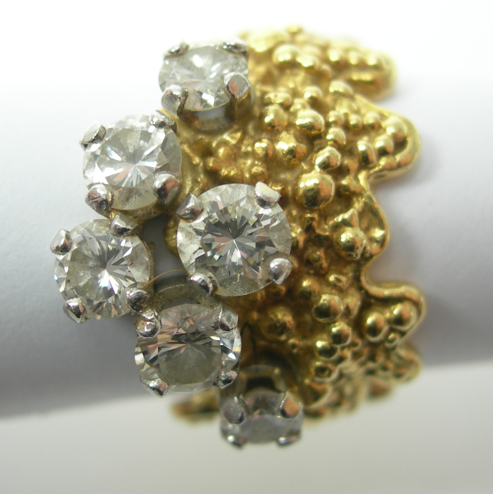 A modern diamond cluster ring,