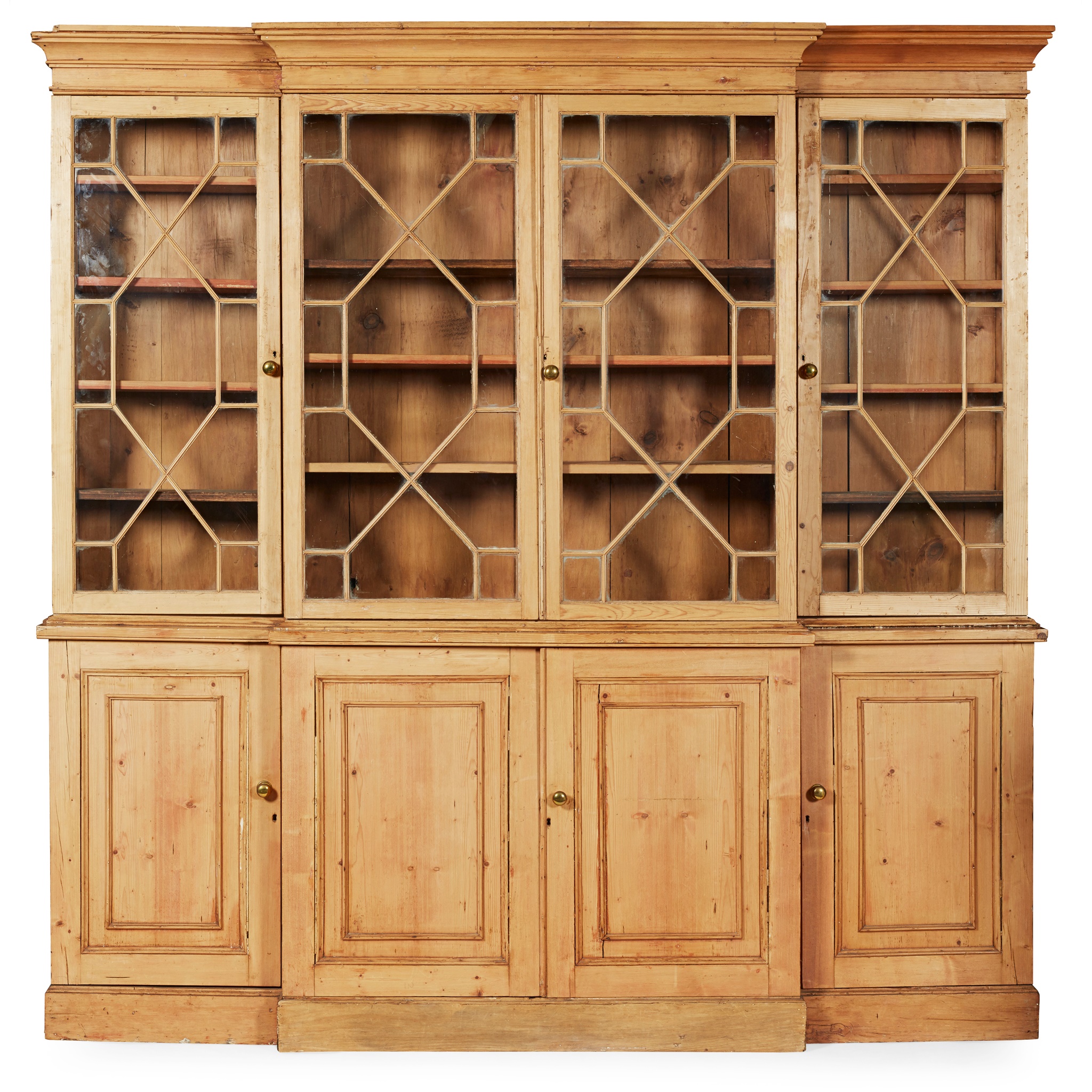 GEORGE III STRIPPED PINE BREAKFRONT BOOKCASE
