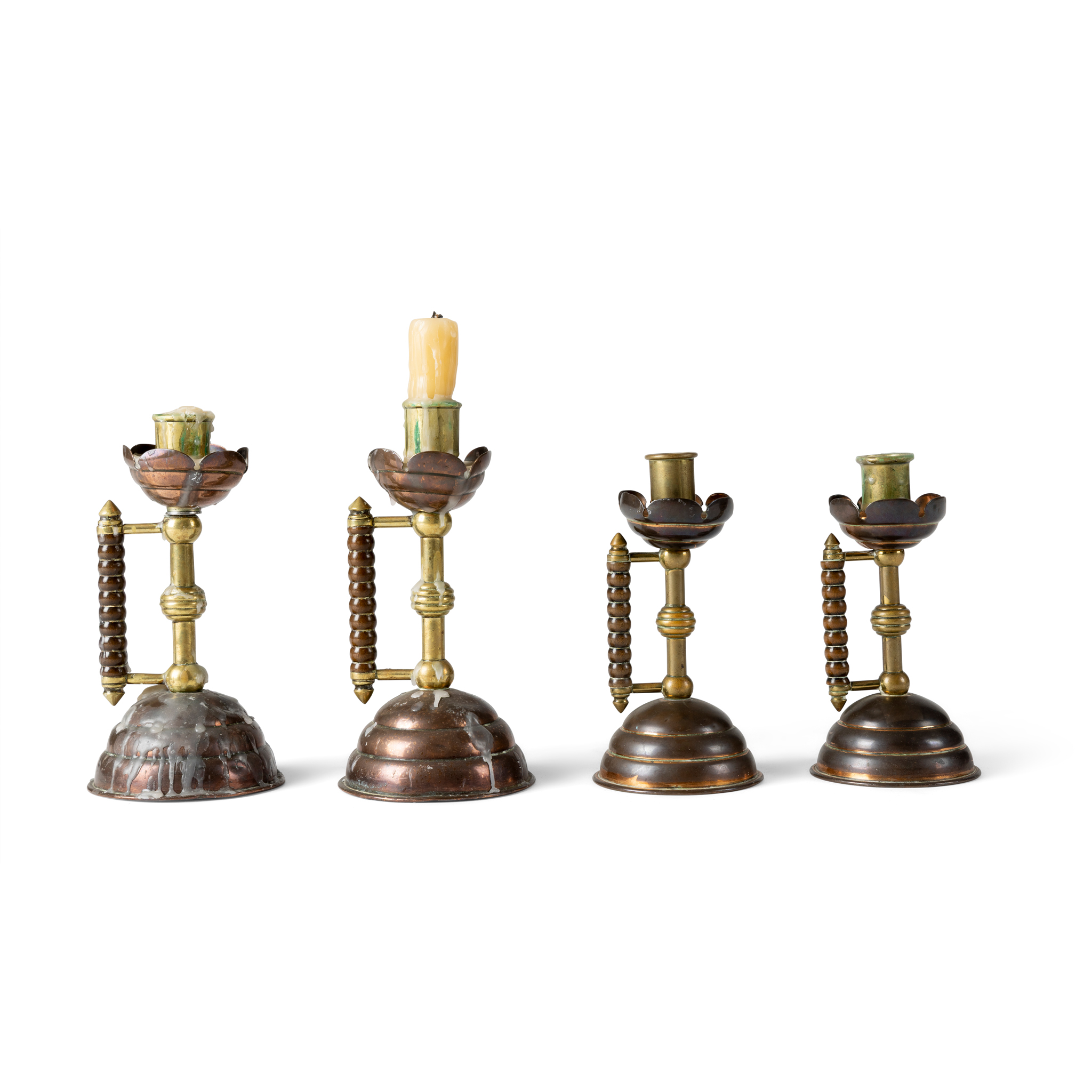 TWO PAIRS OF ARTS & CRAFTS CANDLESTICKS