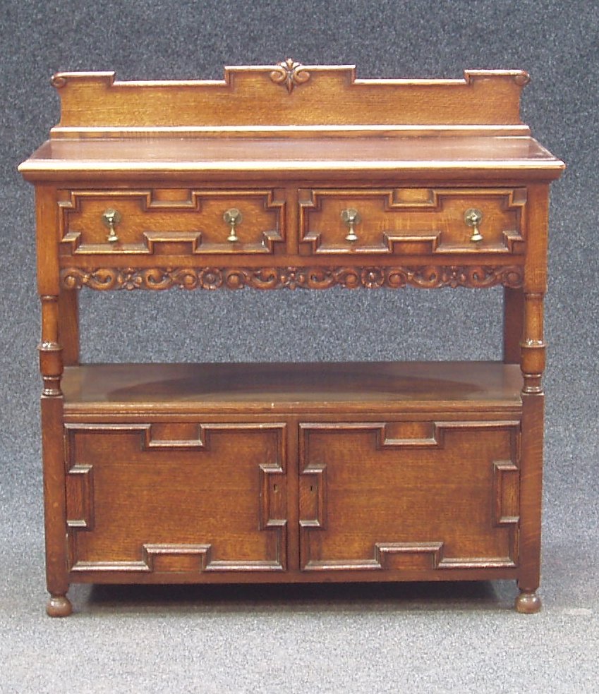 An oak dining room suite,