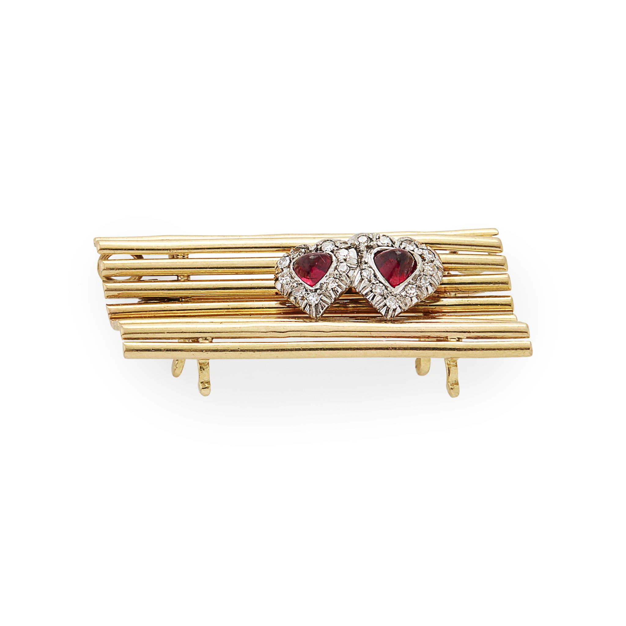 An unusual 1940s diamond and ruby set novelty brooch