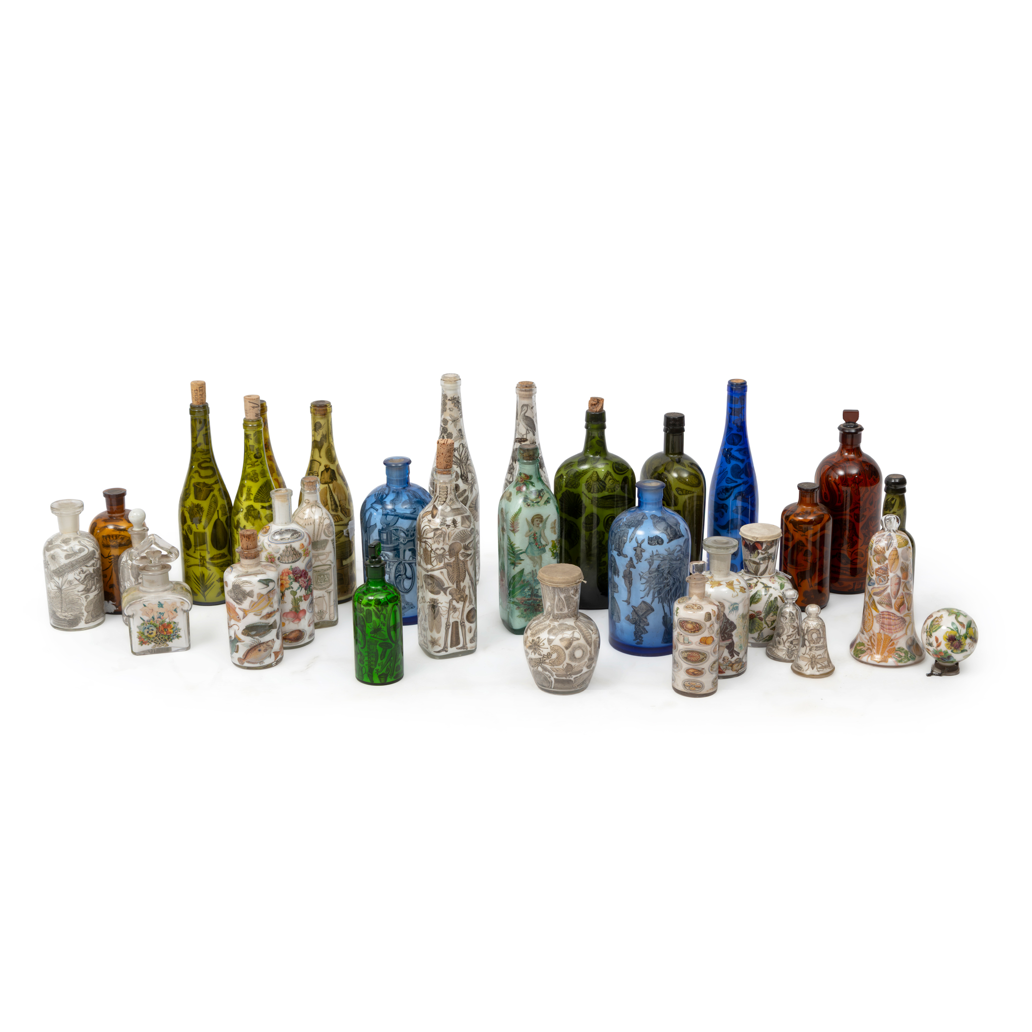 A COLLECTION OF DECORATIVE DECALCOMANIA BOTTLES