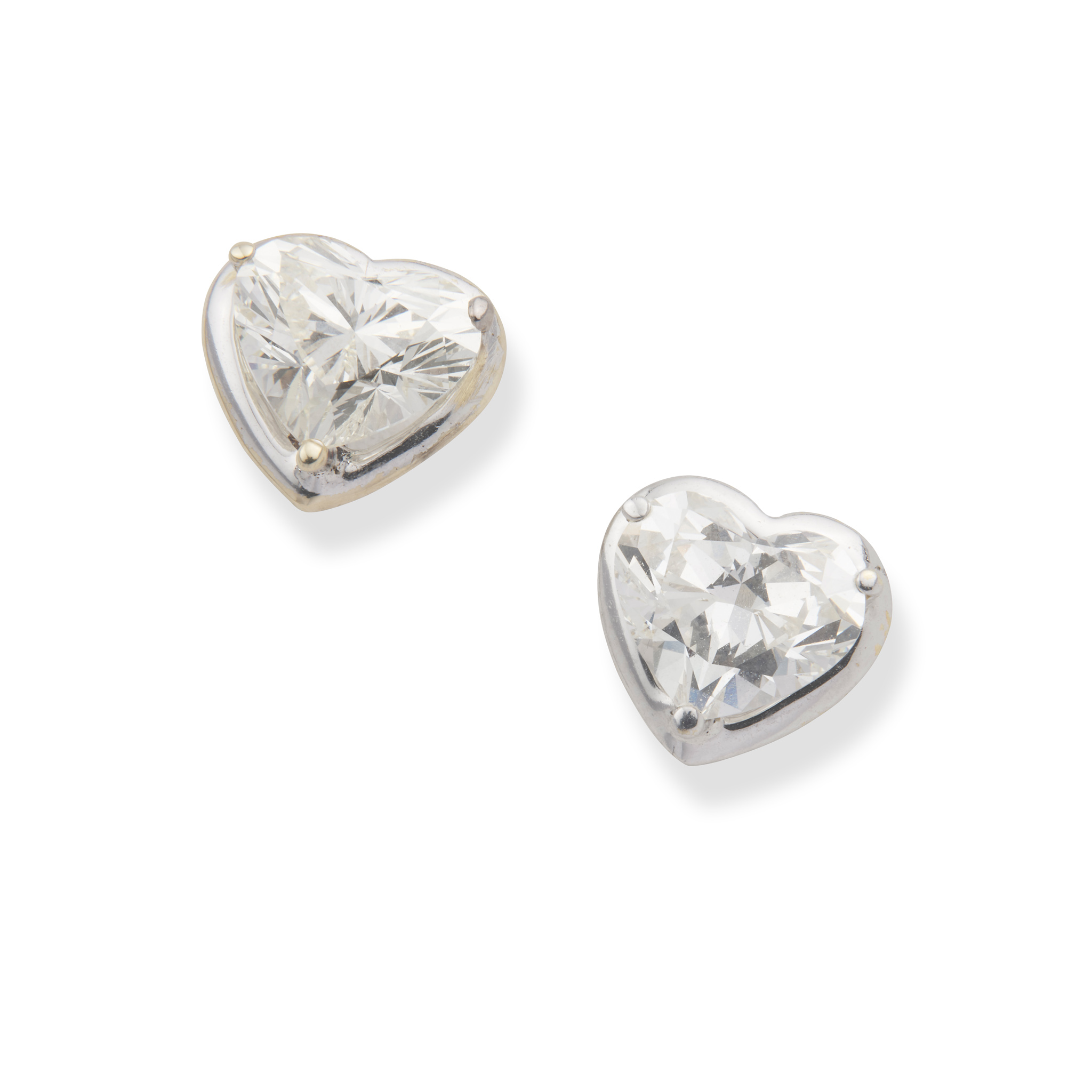 A pair of heart-shaped diamond earstuds