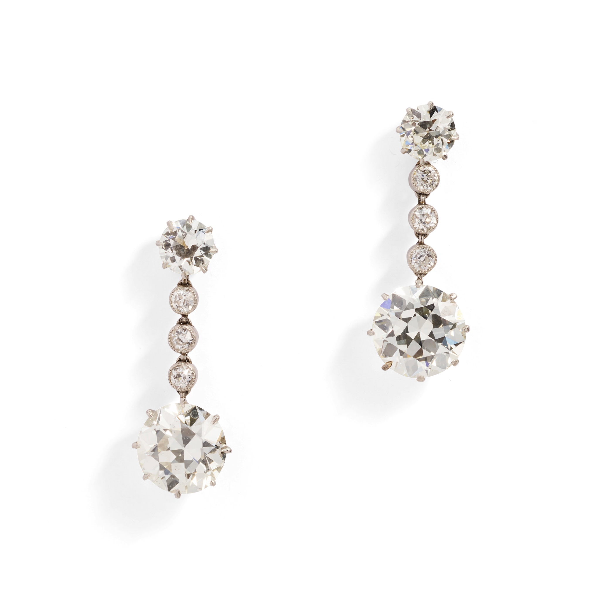 A pair of early 20th century diamond pendent earrings, circa 1910