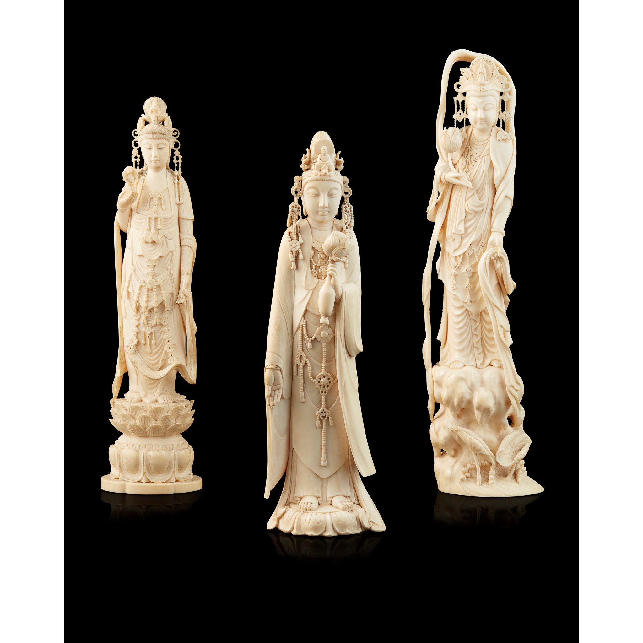 GROUP OF THREE IVORY OKIMONO OF KANNON