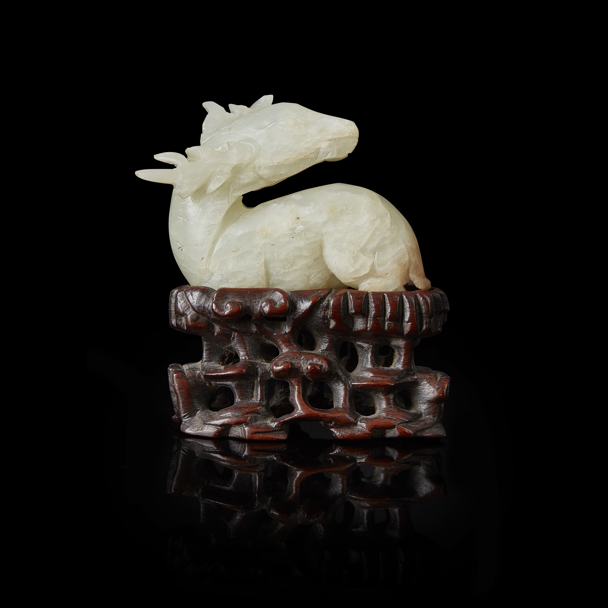 GROUP OF TWO MING STYLE PALE CELADON JADE CARVINGS