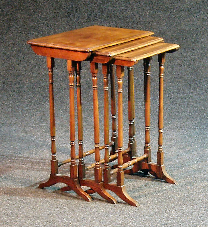 A Georgian style mahogany nest of three tables,