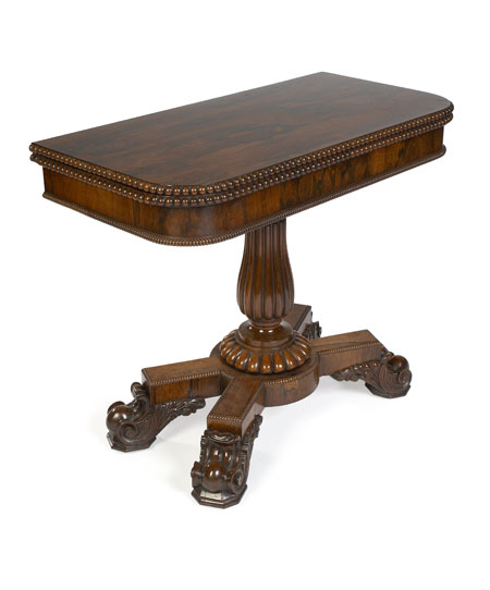 A Regency period rosewood foldover games table Possibly Scottish