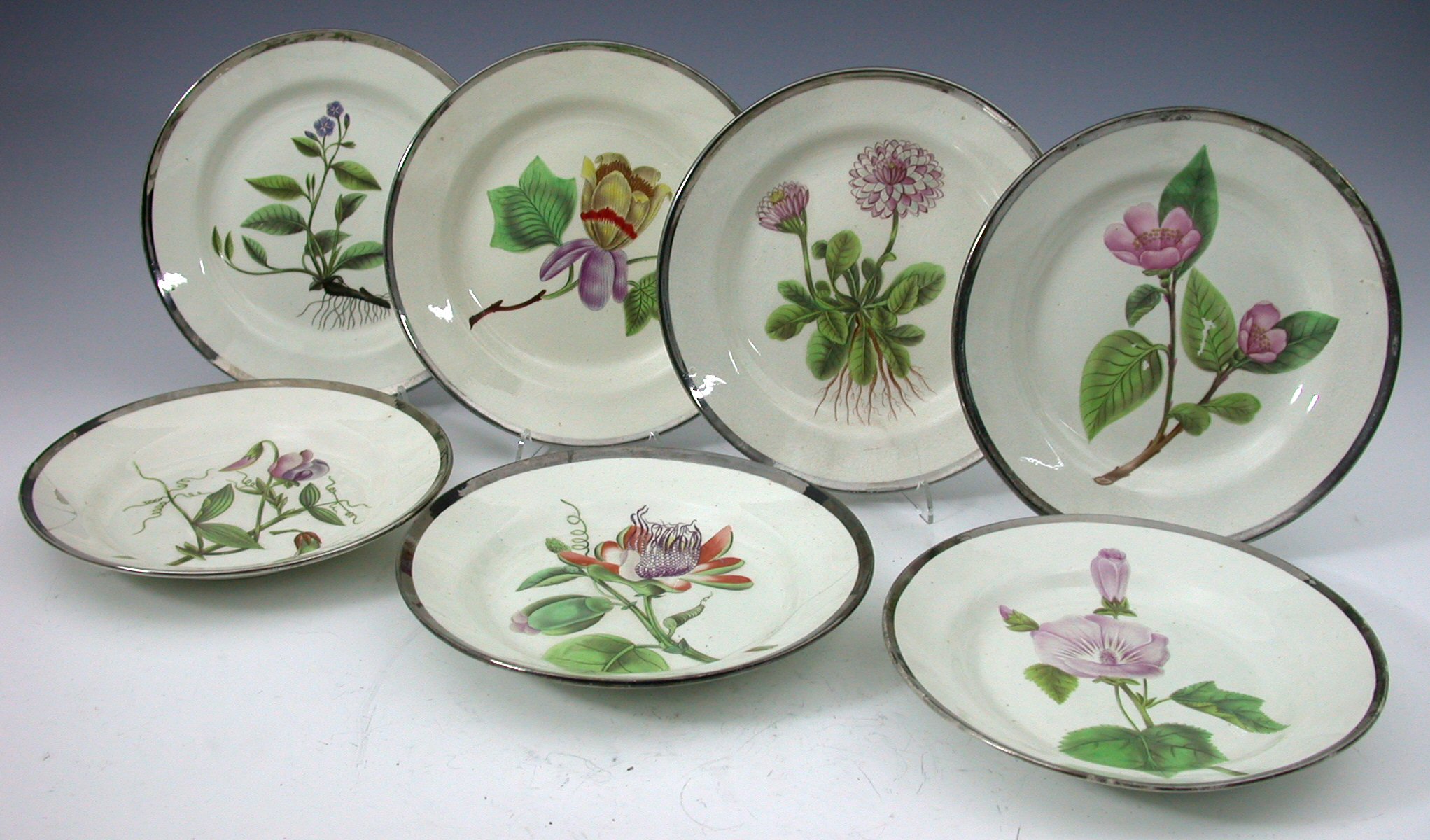 A set of seven creamware plates,