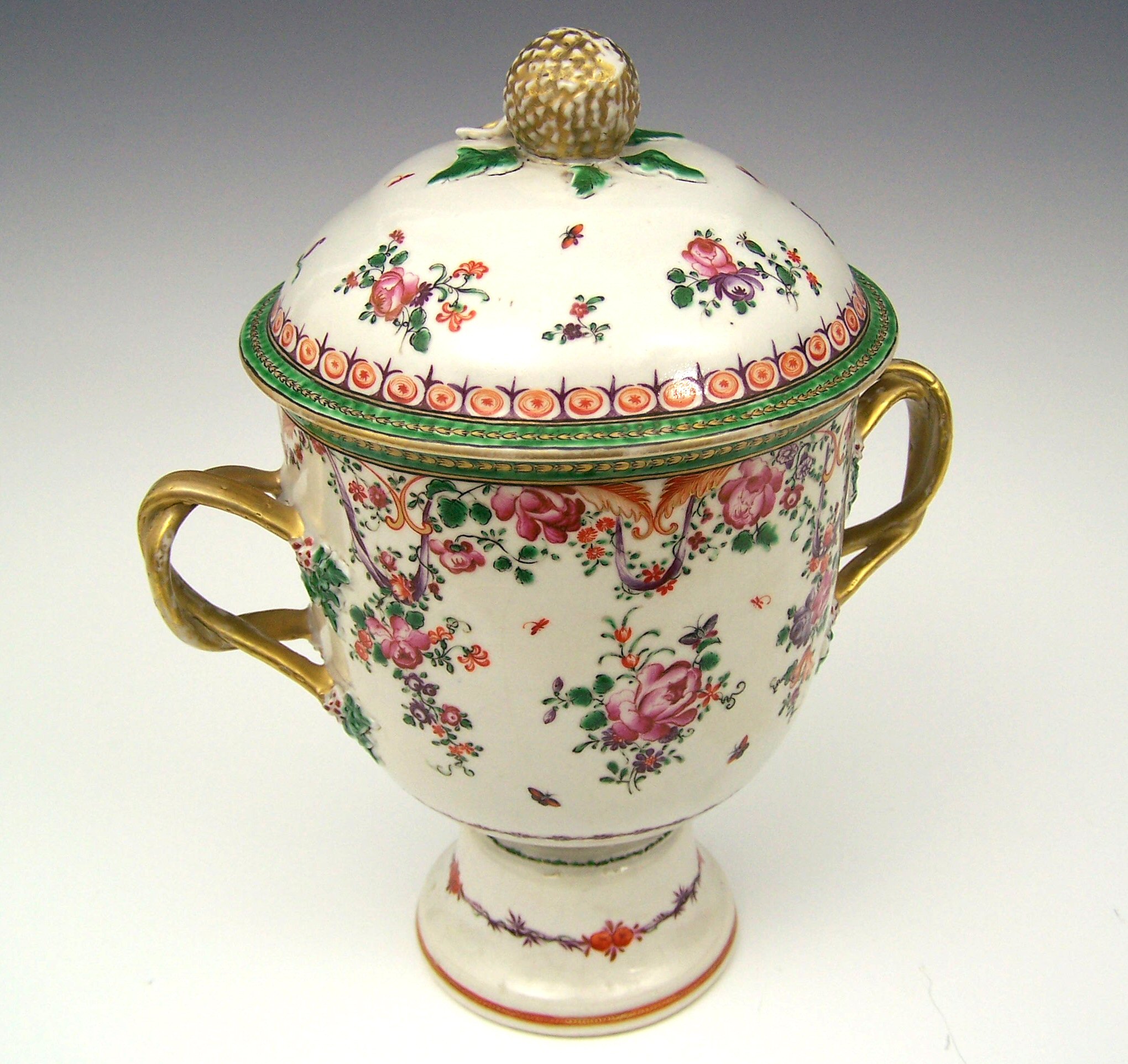 A Chinese famille rose twin handled urn and cover, 18th century,