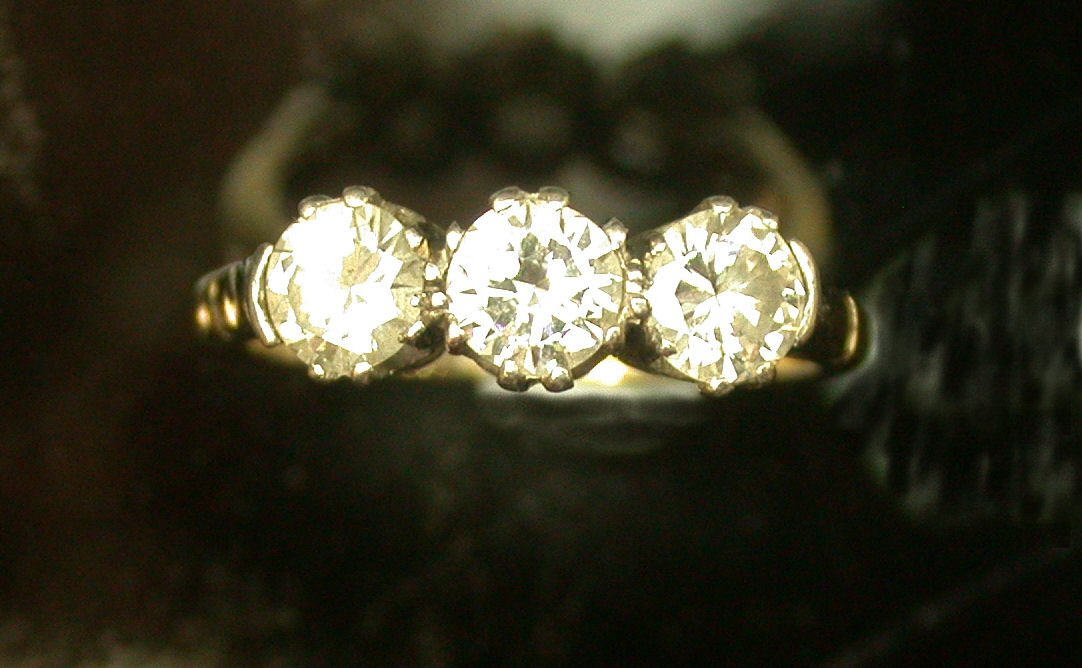 A diamond three-stone ring,