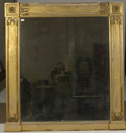 A late Regency giltwood overmantel mirror