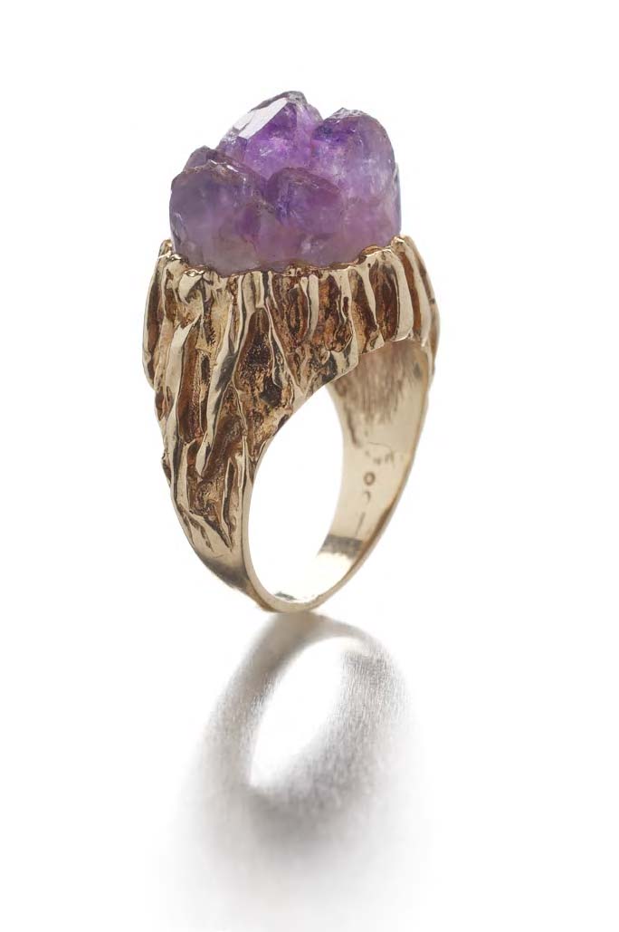 A 1970's rose gold mounted amethyst crystal ring,