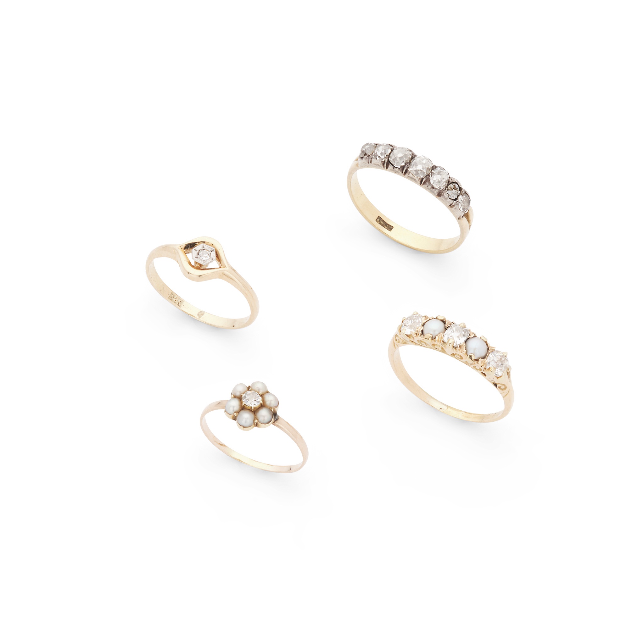 A collection of pearl and diamond rings