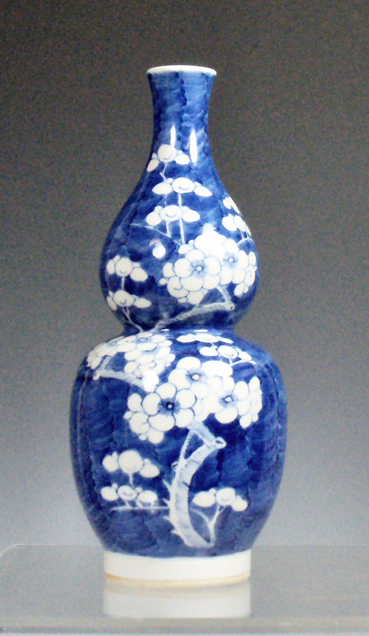 A 19th century Chinese double gourd vase