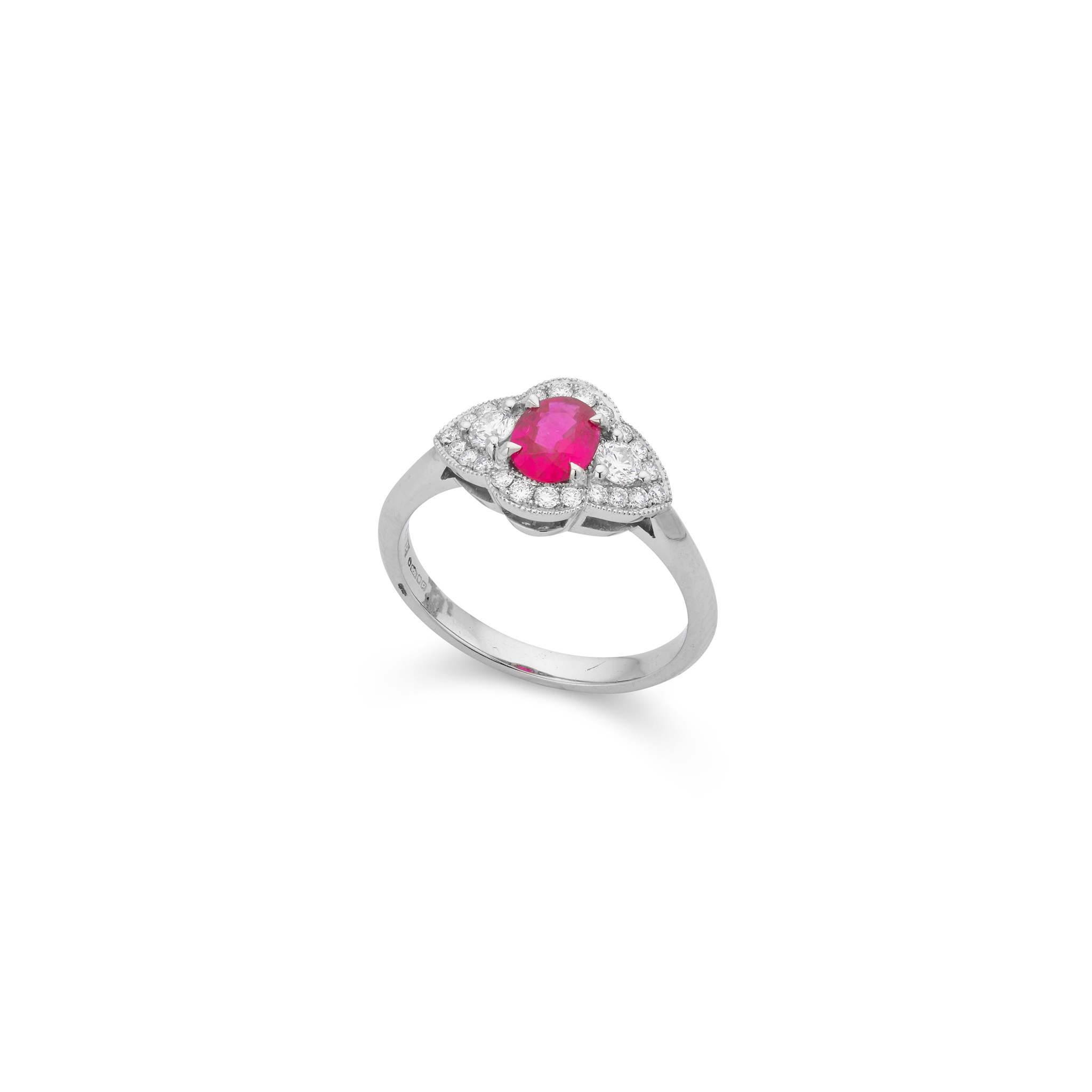 A ruby and diamond cluster ring in platinum