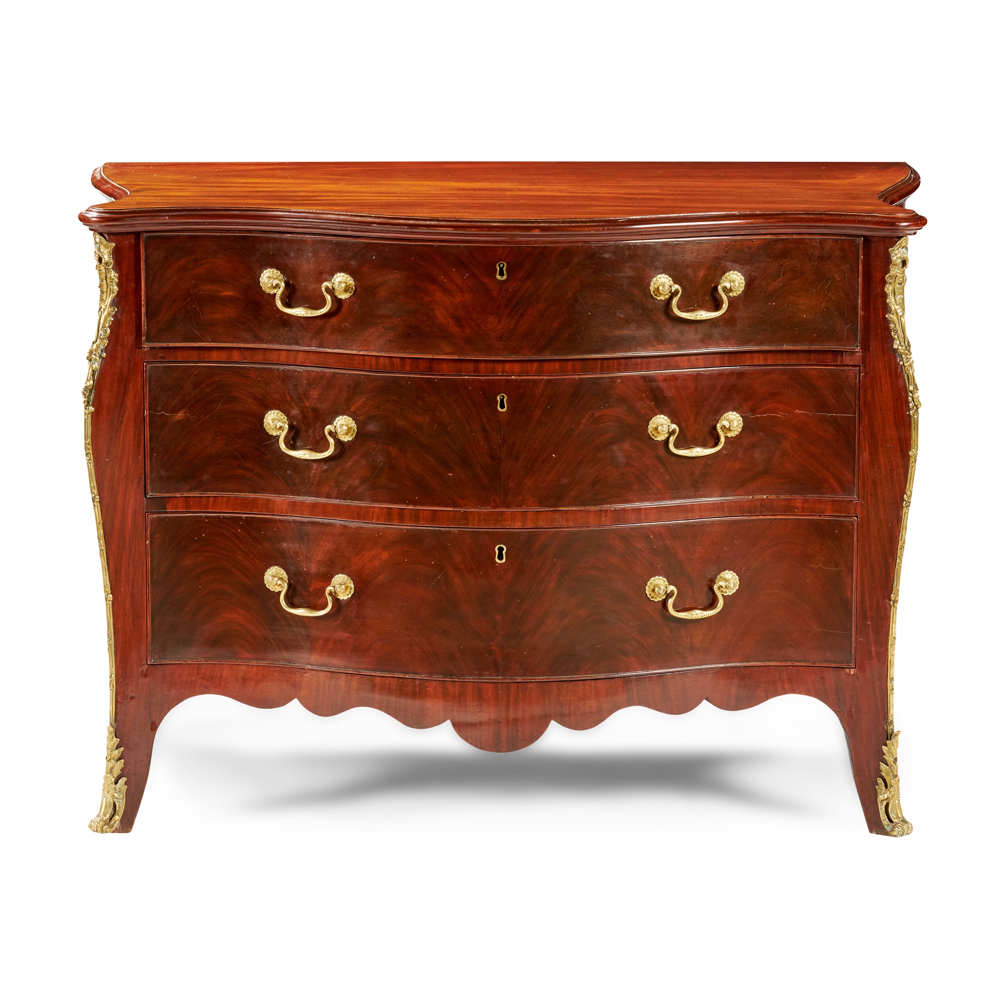 GEORGE III MAHOGANY AND GILT METAL MOUNTED SERPENTINE COMMODE, ATTRIBUTED TO HENRY HILL OF MARLBOROUGH