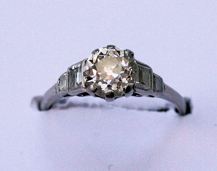 An early 20th century platinum mounted diamond set ring
