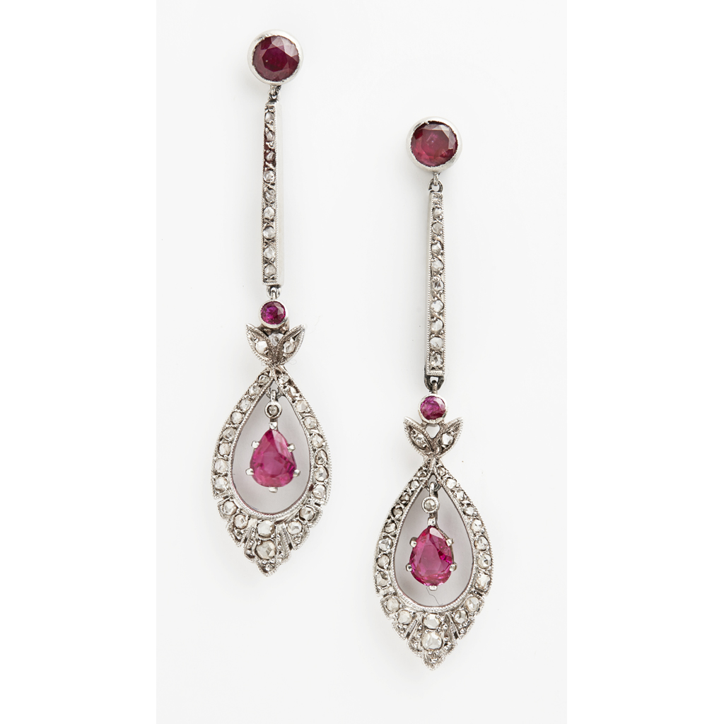 A pair of ruby and diamond set pendant earrings