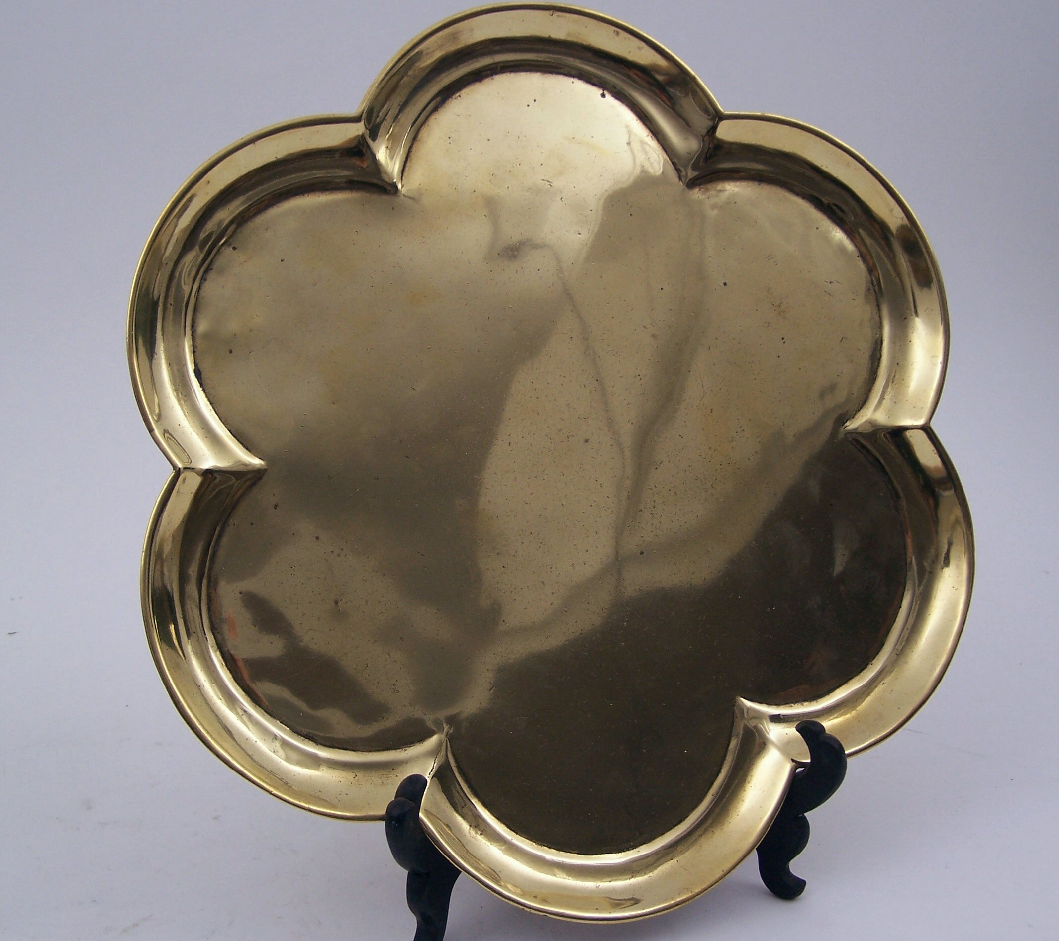 An 18th century brass waiter,