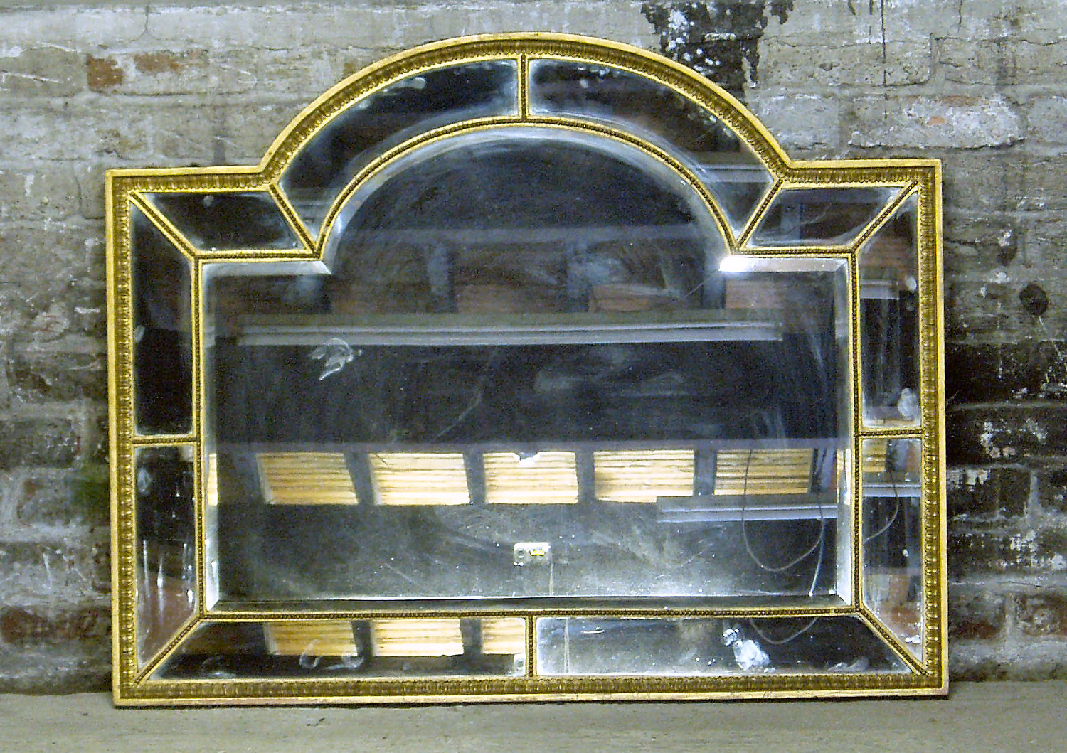 A 19th century gilt wood overmantel mirror