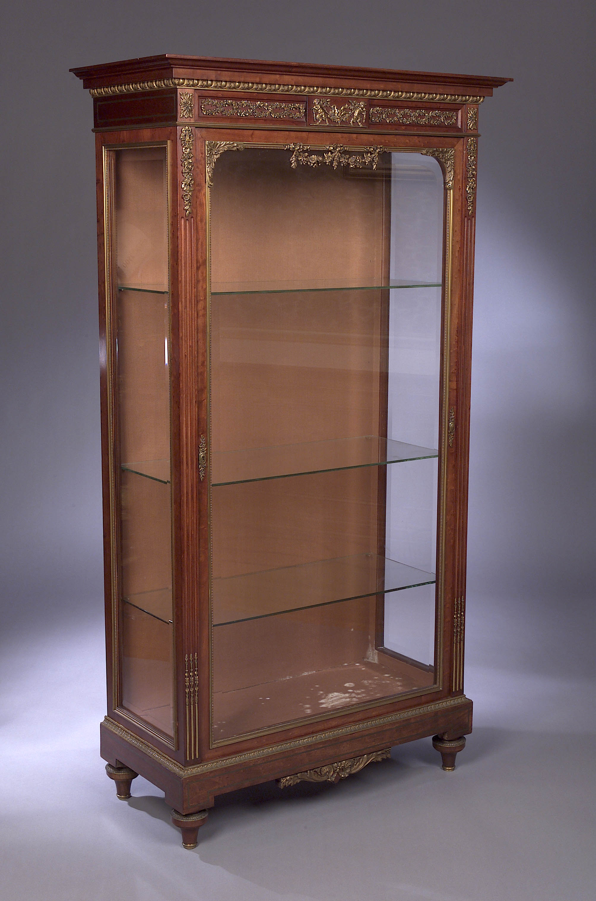 An Edwardian Louis XVI style mahogany and ormolu mounted vitrine cabinet