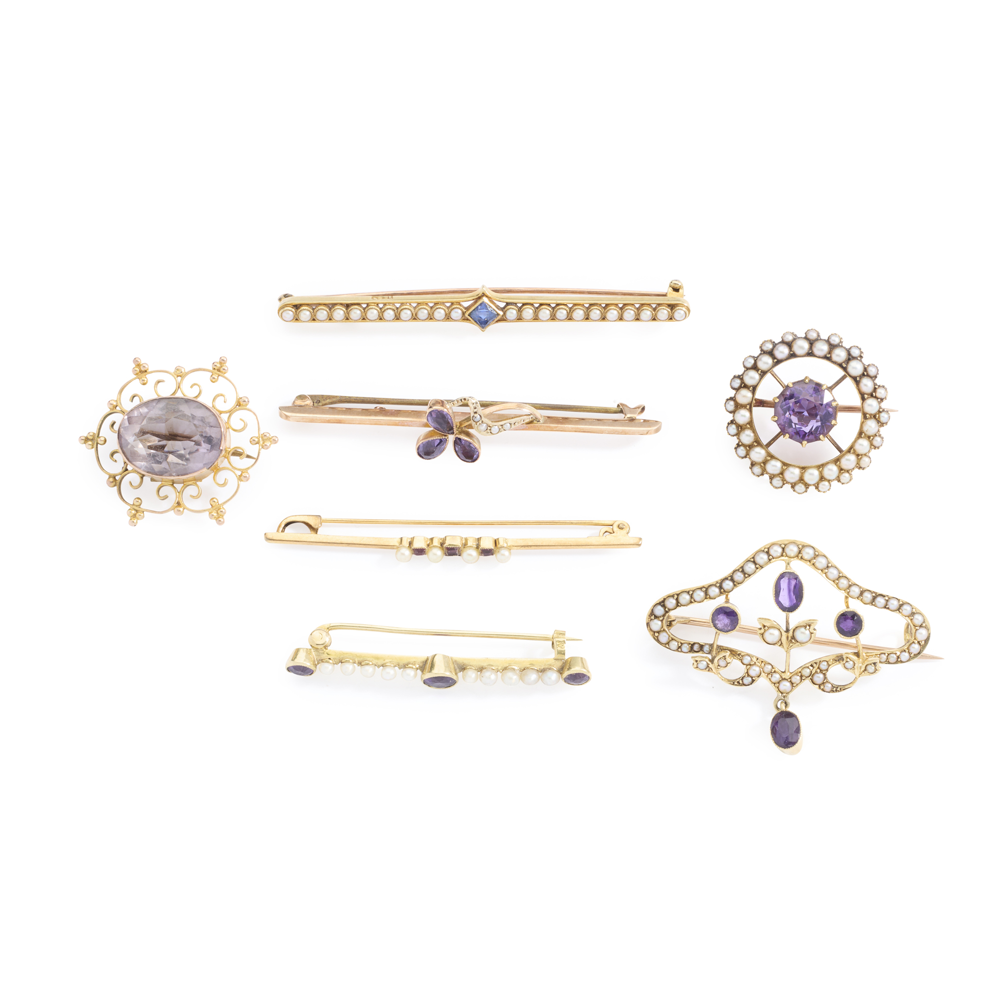 A collection of early 20th century gem set brooches