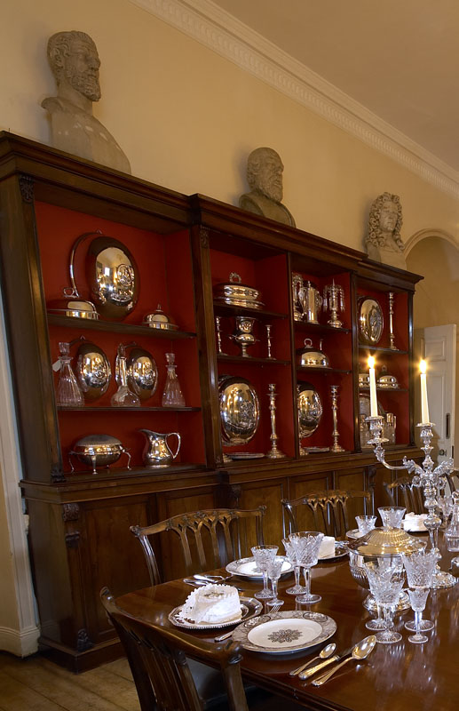 A large Victorian rosewood breakfront bookcase