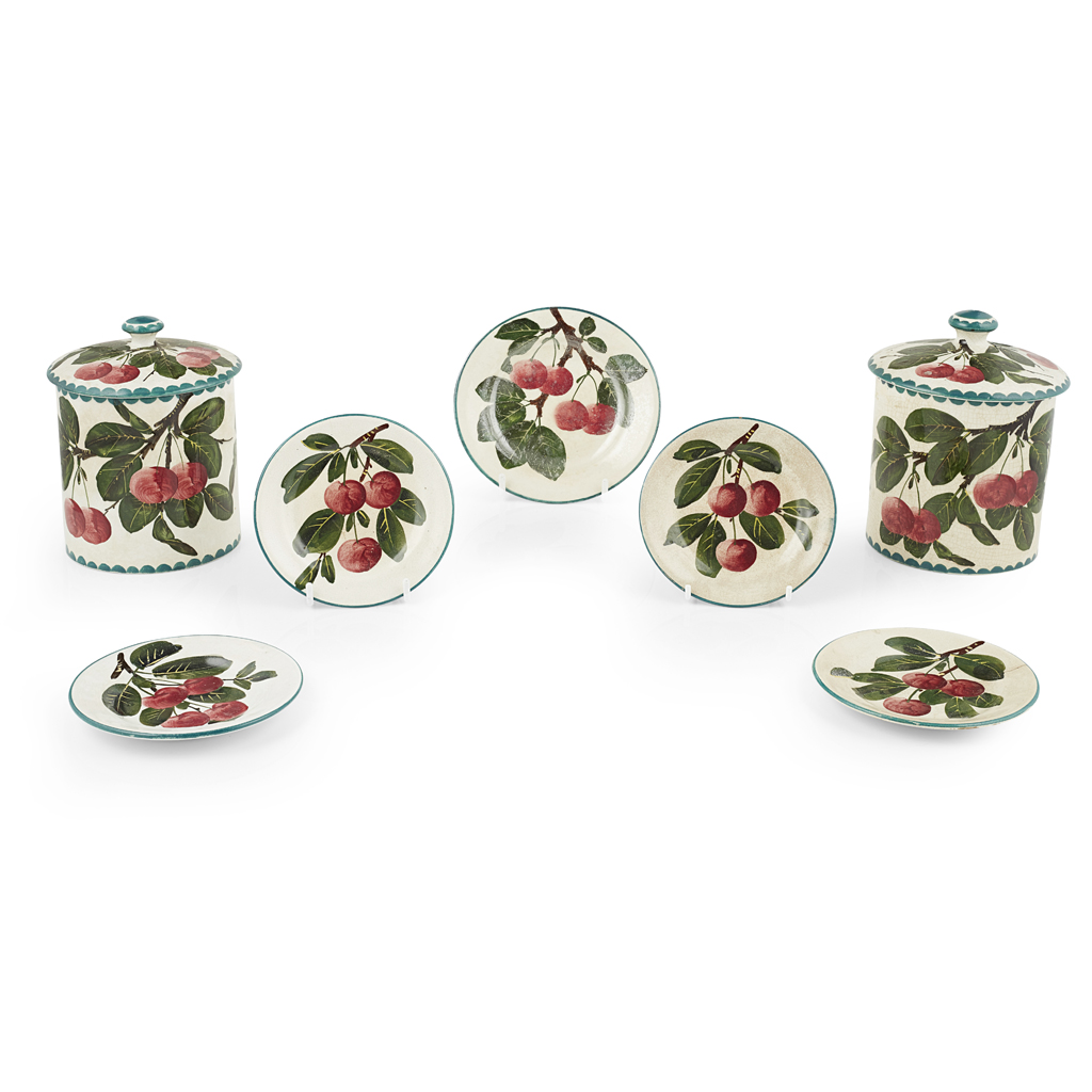 TWO WEMYSS WARE BISCUIT BARRELS AND COVERS