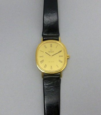 OMEGA - A gentleman's 18ct gold cased wrist watch