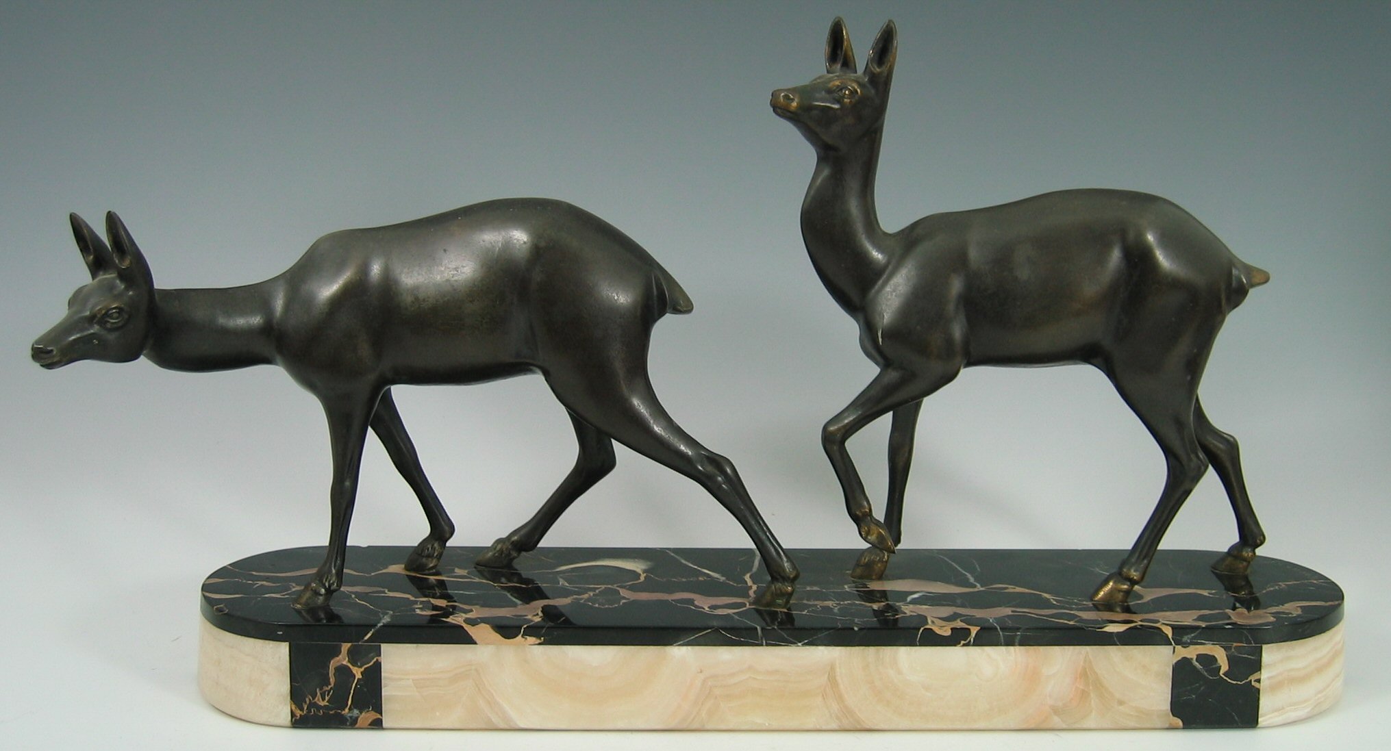 * Rochard An Arts Deco bronzed figure group,