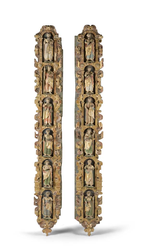 A pair of 17th century carved wood and polychrome pilasters Probably Austrian