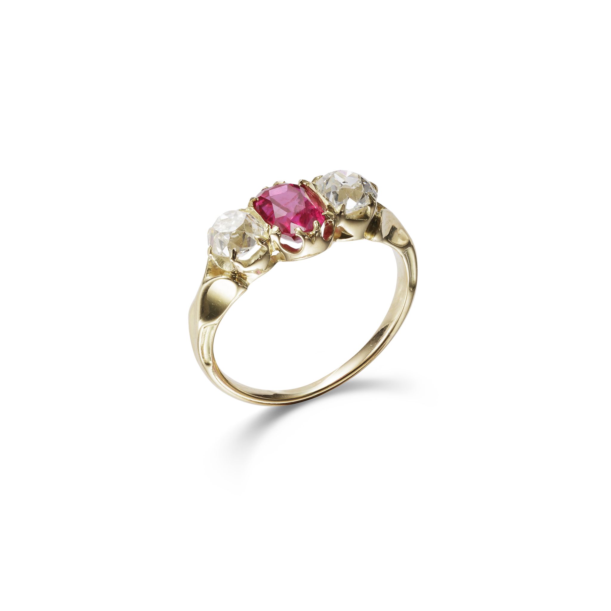 A ruby and diamond three-stone ring