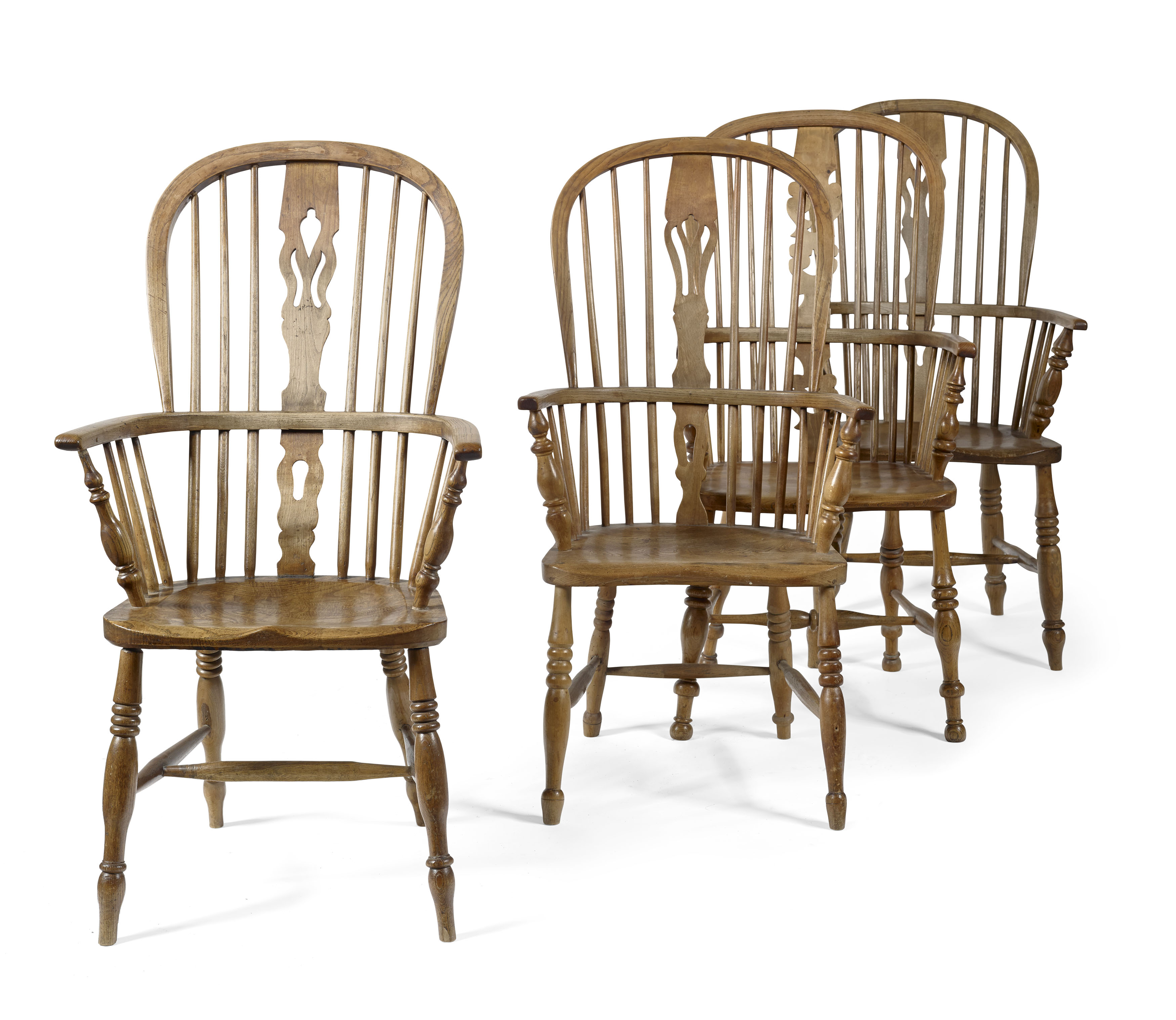 MATCHED SET OF FOUR ELM AND YEW WOOD HOOP BACK ARMCHAIRS