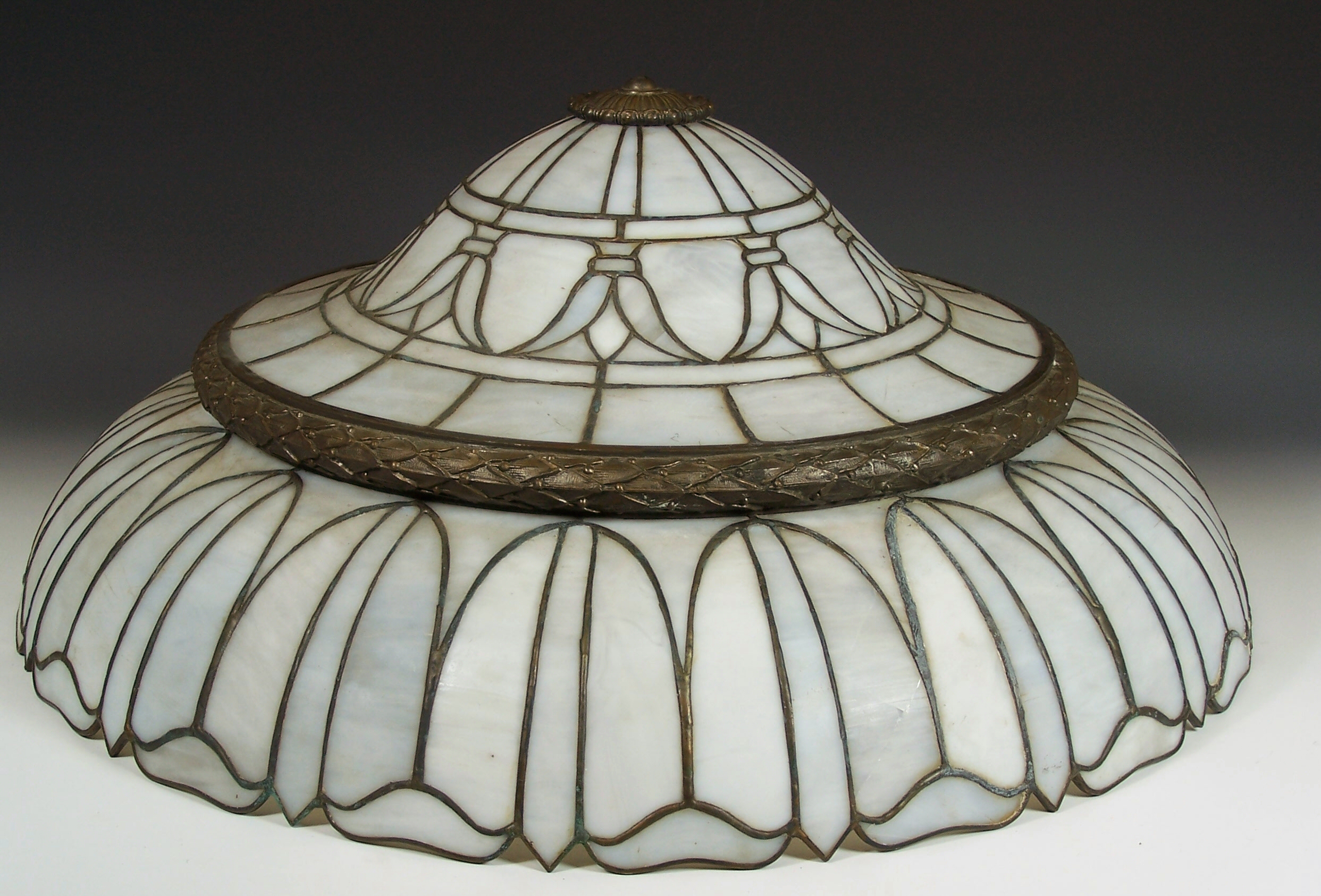 A pair of Art Nouveau style circular leaded opaque glass plaffoniers,