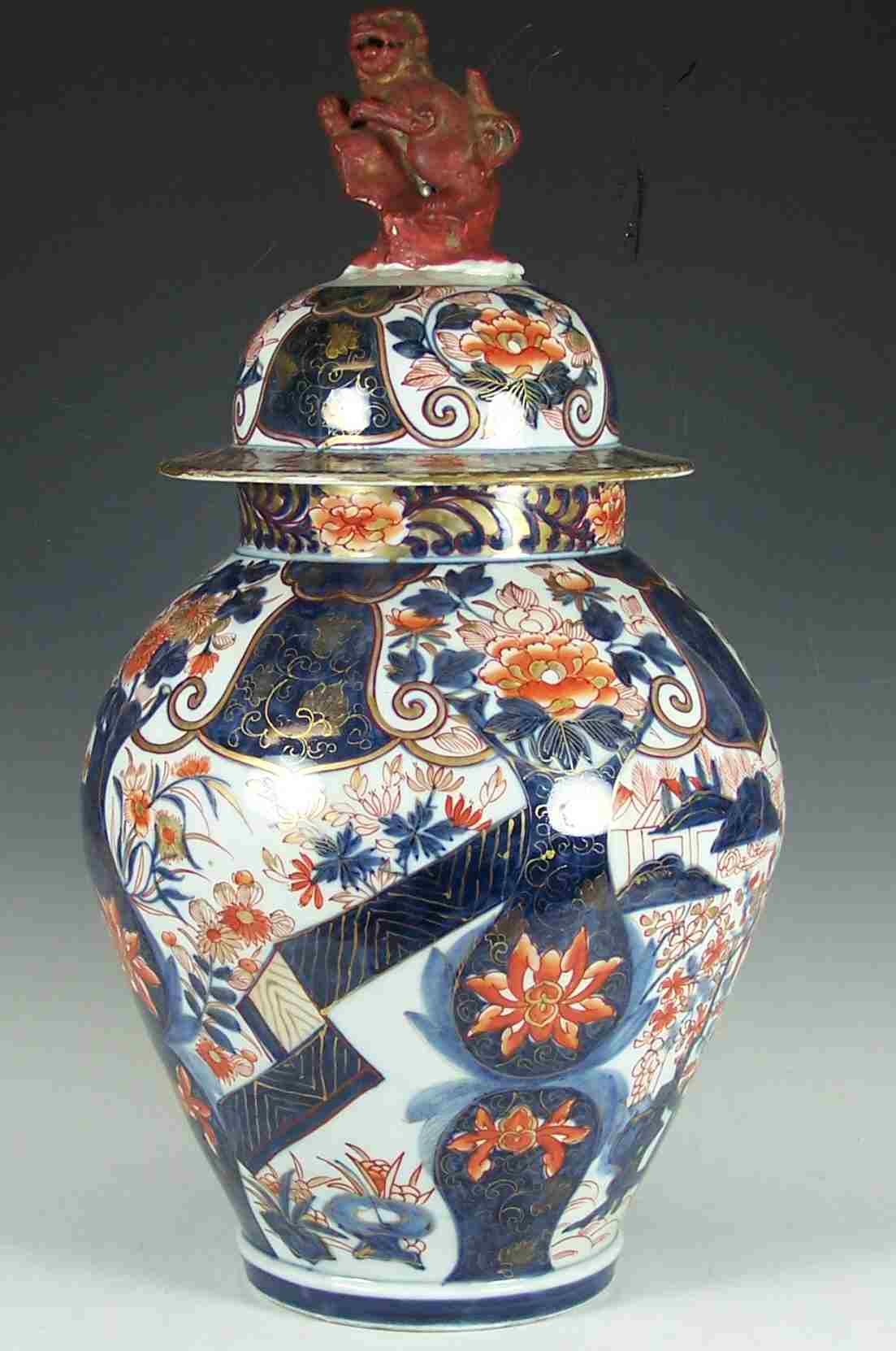 A large Japanese Imari oviform vase and cover,